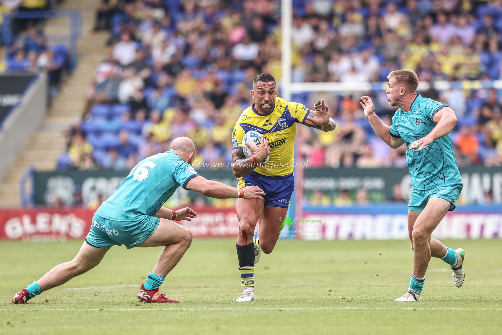 Paul Vaughan of Warrington Wolves breaks with the ball during the Betfred Super League round 15 match Warrington Wolves vs Huddersfield Giants at Halliwell Jones Stadium, Warrington, United Kingdom, 21st June 2025

(Photo by Alfie Cosgrove/News Images)