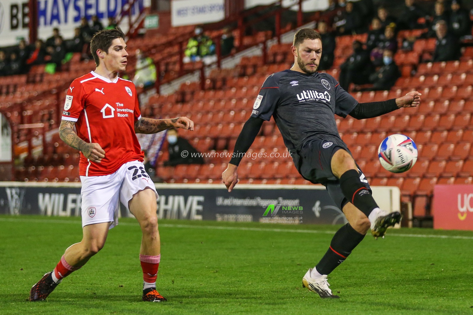 Henrik Dalsgaard #22 of Brentford clears away the ball during the game
