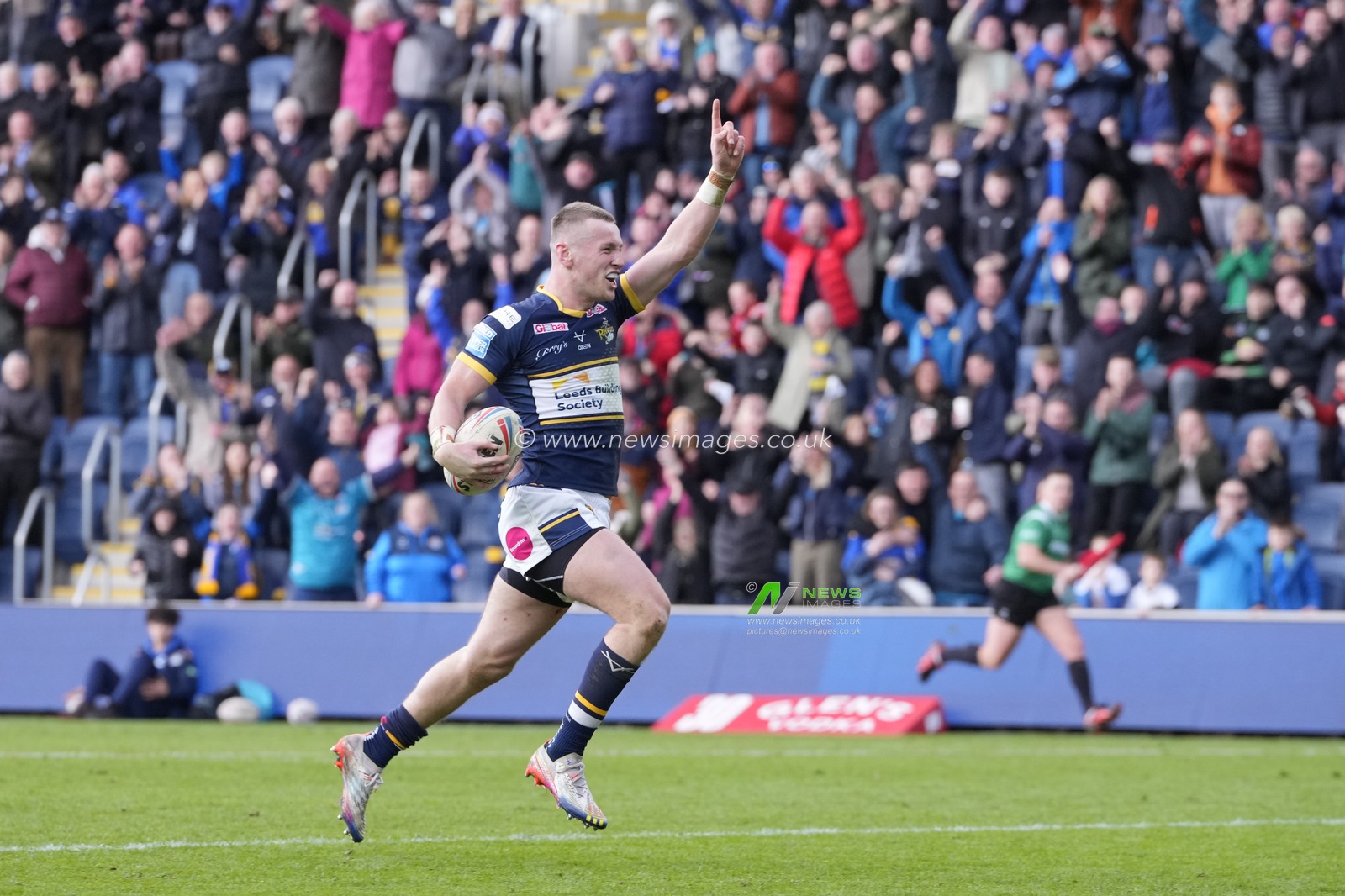Harry Newman #3 of Leeds Rhinos breaks away to score a try during the Betfred Super League Round 6 match Leeds Rhinos vs Catalans Dragons at Headingley Stadium, Leeds, United Kingdom, 25th March 2023

(Photo by Steve Flynn/News Images)