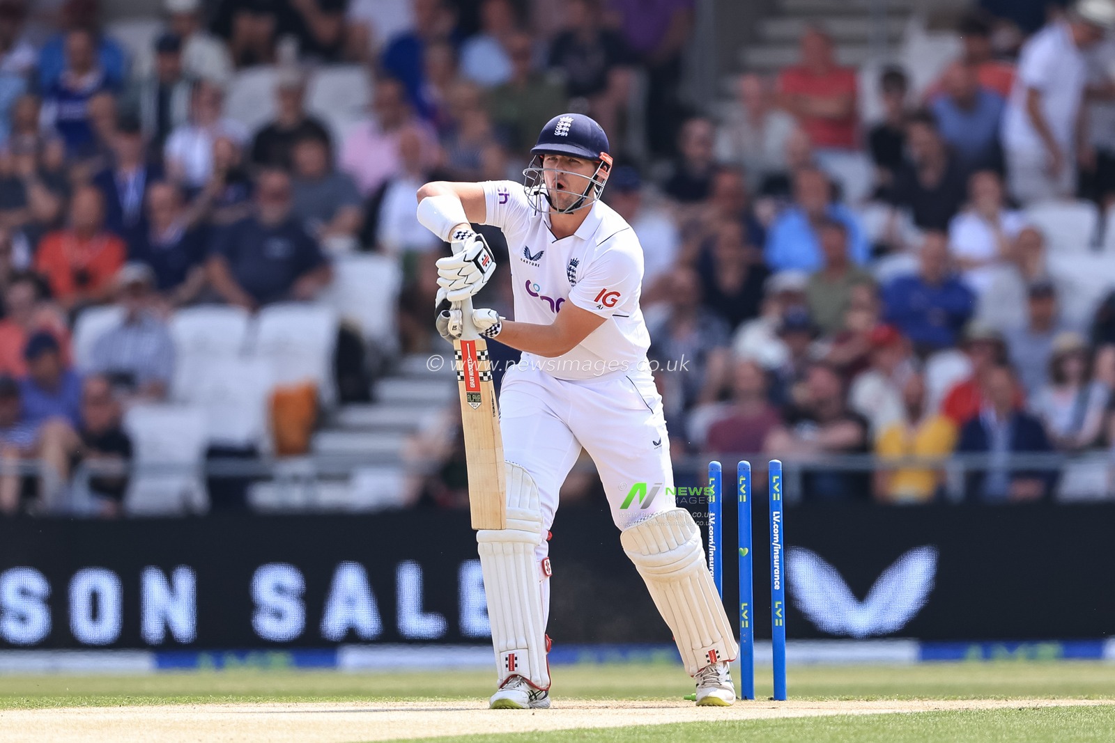 Alex Lees of England is bowled out by Trent Boult of New Zealand