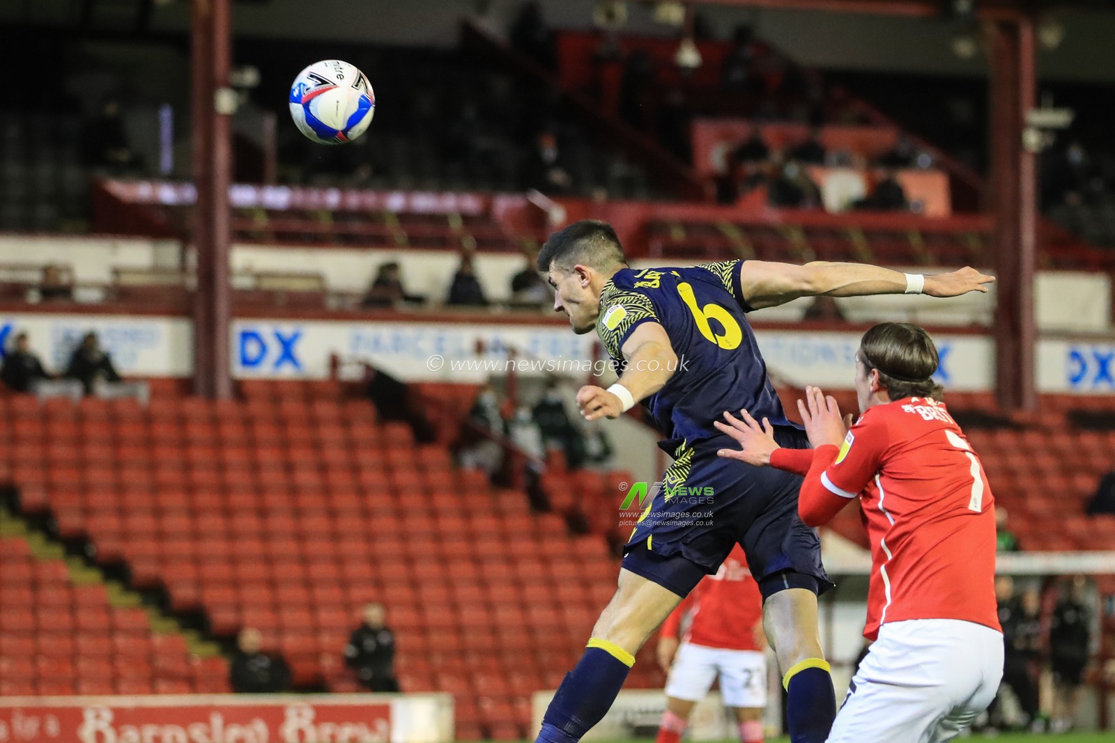 Danny Batth #6 of Stoke City heads on goal, well over the crossbar
