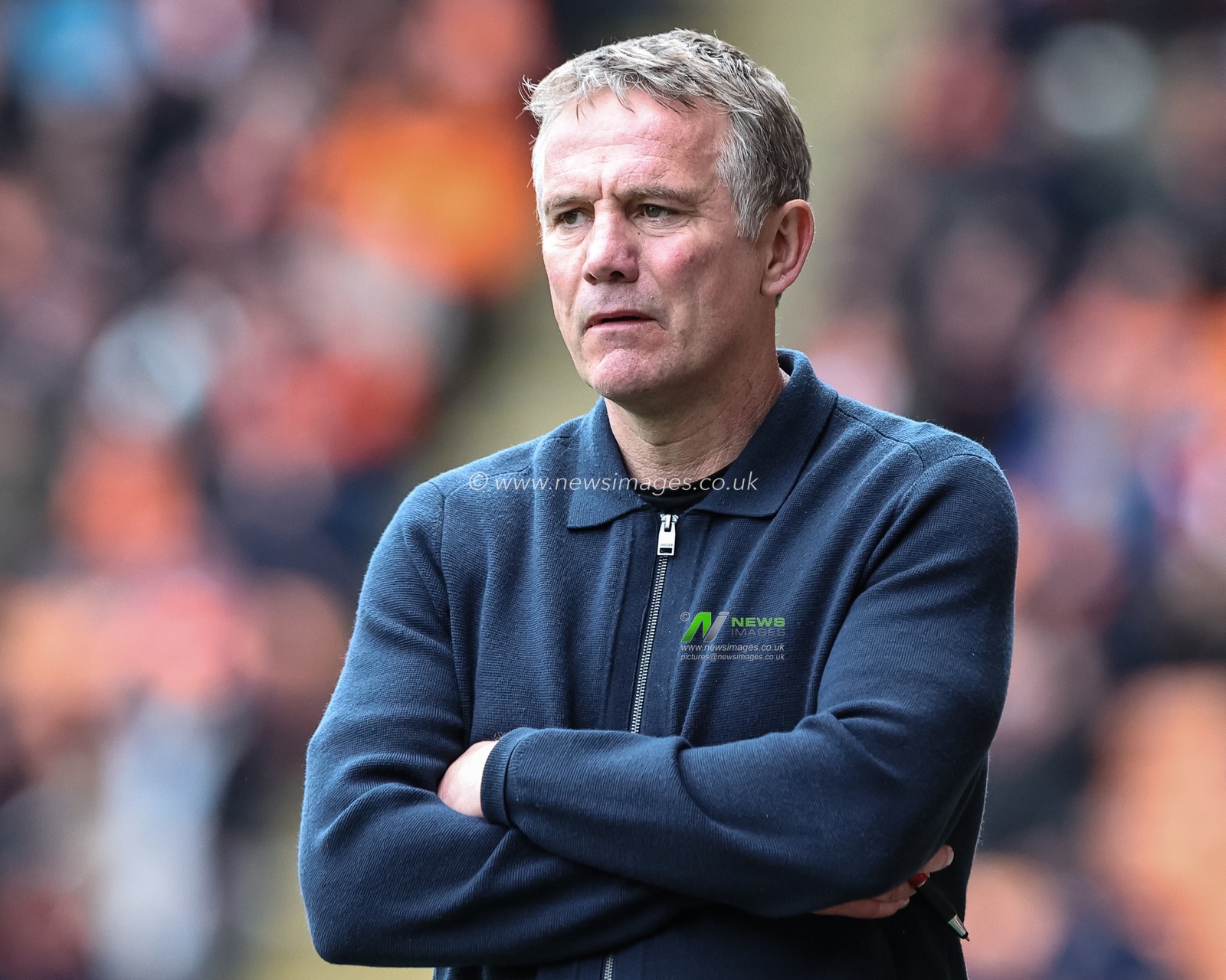 Phil Parkinson manager of Wrexham looks on during the Sky Bet League 1 match Blackpool vs Wrexham at Bloomfield Road, Blackpool, United Kingdom, 21st April 2025

(Photo by Mark Cosgrove/News Images)
