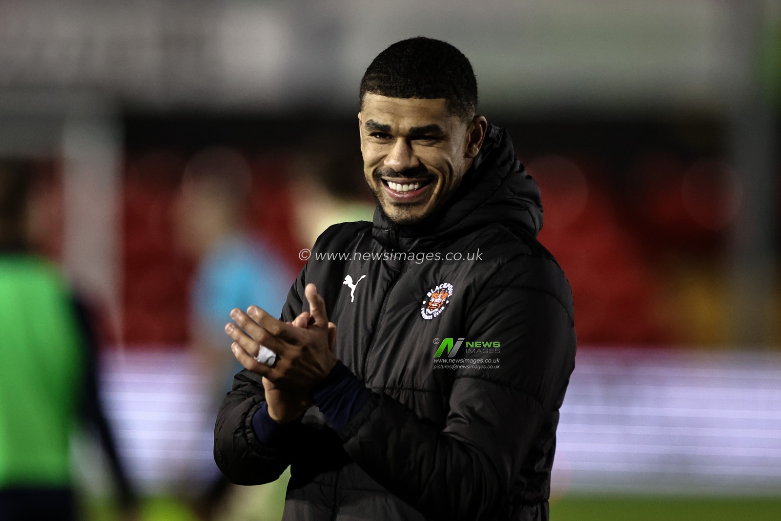 Ashley Fletcher of Blackpool applauds the fans after the final whistle during the Sky Bet League 1 match Lincoln City vs Blackpool at Gelder Group Sincil Bank Stadium, Lincoln, United Kingdom, 28th January 2025

(Photo by Mark Cosgrove/News Images)