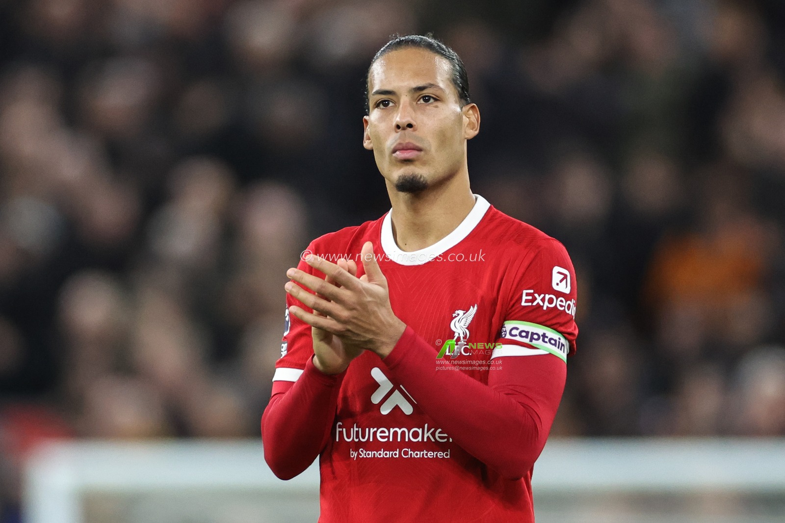 Virgil van Dijk of Liverpool applauds the home fans during the Premier League match Liverpool vs Manchester United at Anfield, Liverpool, United Kingdom, 17th December 2023

(Photo by Mark Cosgrove/News Images)