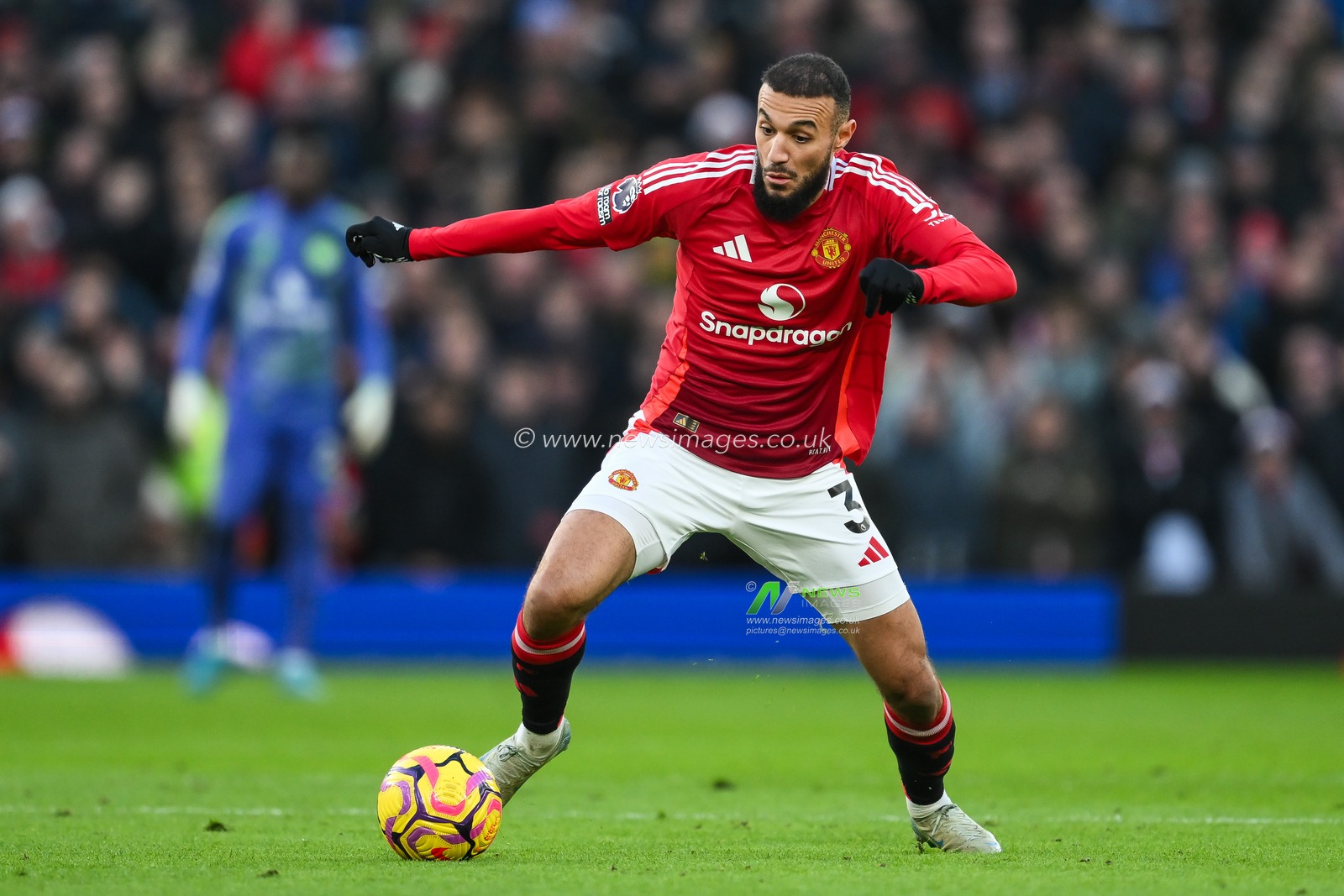 Noussair Mazraoui of Manchester United makes a break with the ball during the Premier League match Manchester United vs Bournemouth at Old Trafford, Manchester, United Kingdom, 22nd December 2024

(Photo by Craig Thomas/News Images)