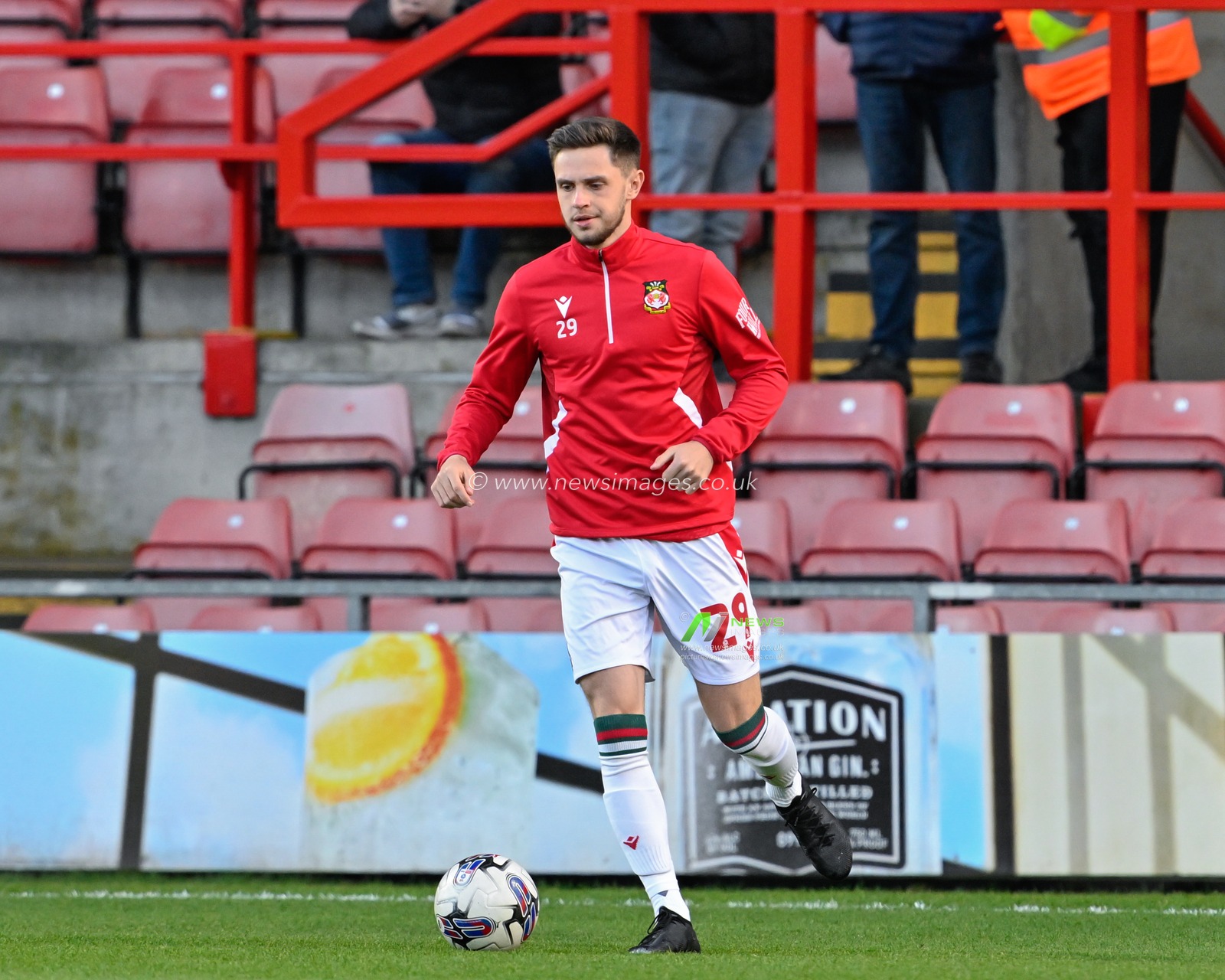 Ryan Barnett of Wrexham warms up ahead of the match, during the Sky Bet League 2 match Wrexham vs Crawley Town at SToK Cae Ras, Wrexham, United Kingdom, 9th April 2024

(Photo by Cody Froggatt/News Images)