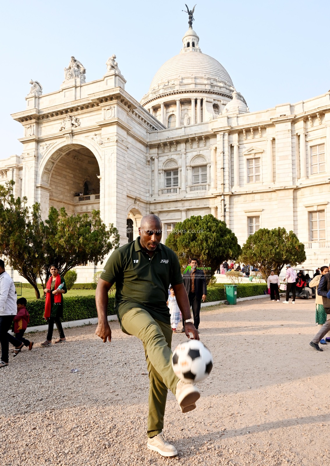 English football manager and former player Sol Campbell  with a football outside the heritage landmark Victoria Memorial in Kolkata, India on December 12,2024.Pictures by Debajyoti Chakraborty.(Photo: Debajyoti Chakraborty/News Images)