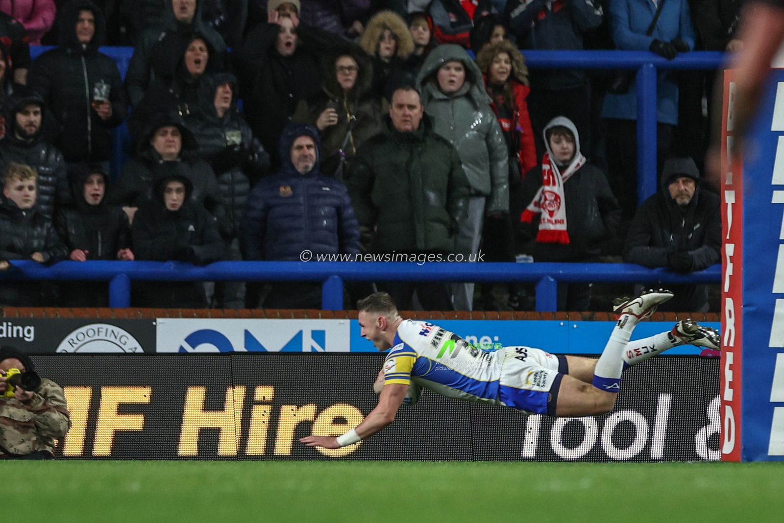 Harry Newman of Leeds Rhinos goes over for a 70 yard solo try during the Betfred Challenge Cup Sixth Round match Leeds Rhinos vs St Helens at Headingley Stadium, Leeds, United Kingdom, 22nd March 2024

(Photo by Mark Cosgrove/News Images)