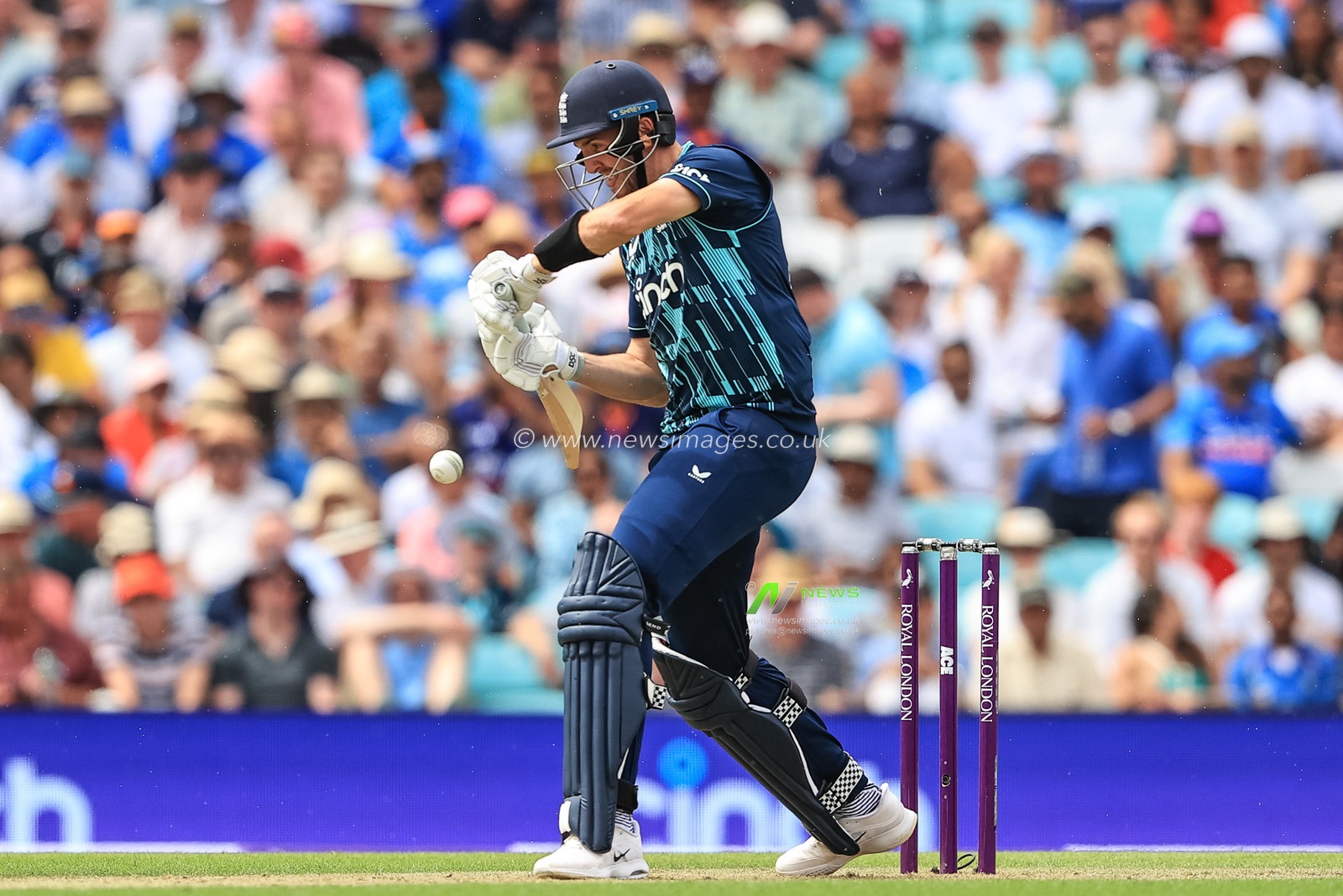 Craig Overton of England hits a four (4)