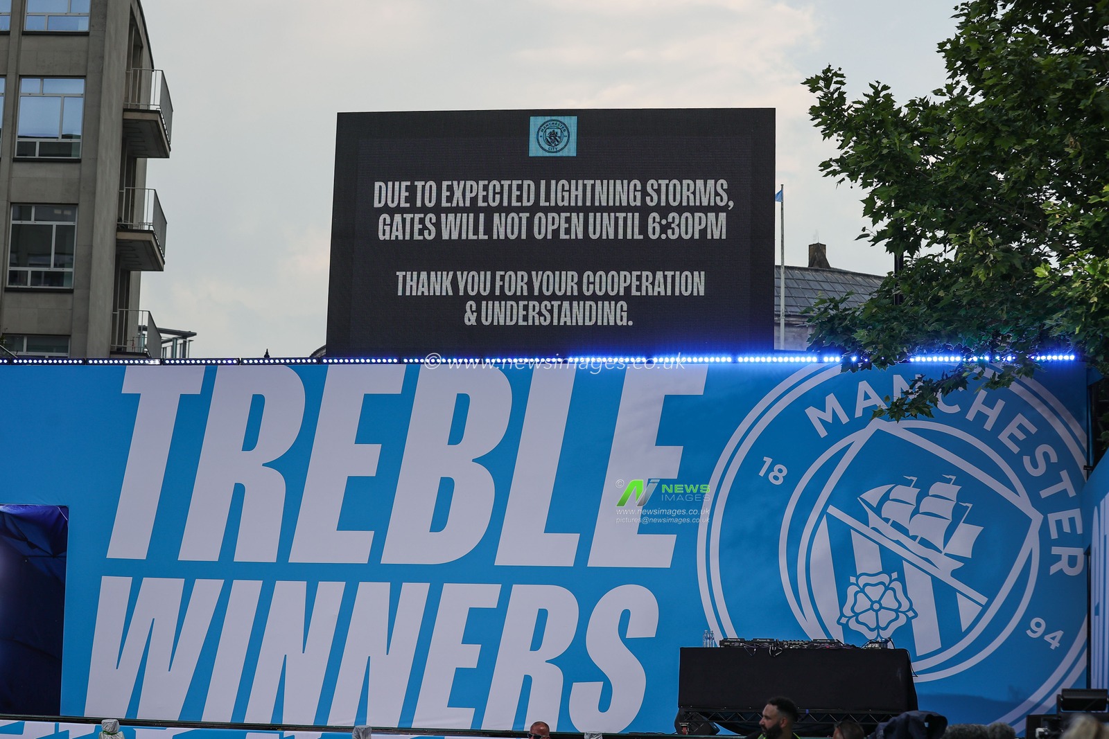 Fans entering the square delayed due to Lighting storms the during Manchester City's Treble victory parade at St Peterâ€™s Square, Manchester, United Kingdom, 12th June 2023

(Photo by Mark Cosgrove/News Images)