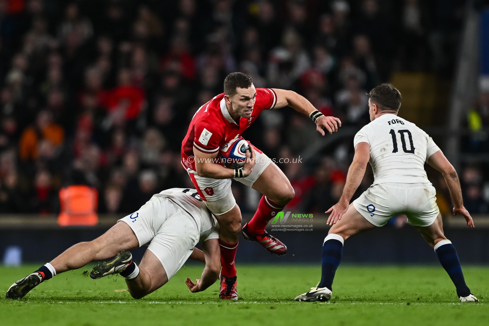 George North of Wales evades the tackle of Theo Dan of England during the 2024 Guinness 6 Nations match England vs Wales at Twickenham Stadium, Twickenham, United Kingdom, 10th February 2024

(Photo by Craig Thomas/News Images)
