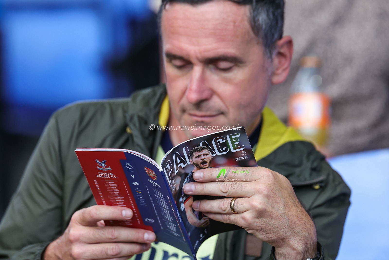 A Fan reads todays match programme ahead of the Premier League match Crystal Palace vs Arsenal at Selhurst Park, London, United Kingdom, 21st August 2023

(Photo by Mark Cosgrove/News Images)
