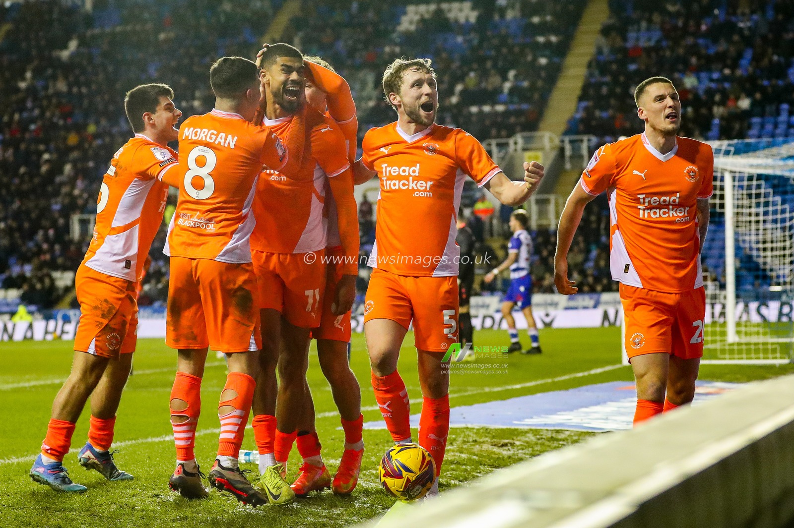 Ashley Fletcher of Blackpool celebrates his goal with teammates to make it 0-3 during the Sky Bet League 1 match Reading vs Blackpool at Select Car Leasing Stadium, Reading, United Kingdom, 14th December 2024

(Photo by Izzy Poles/News Images)