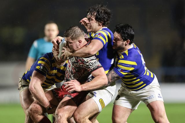 James Bentley of Warrington Wolves tackles AJ Towse of Leigh Leopards during the Pre Season match Warrington Wolves vs Leigh Leopards at Halliwell Jones Stadium, Warrington, United Kingdom, 30th January 2026

(Photo by Mark Cosgrove/News Images)