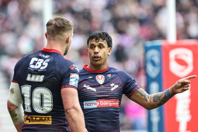 Tristan Sailor of St. Helens speaks to Matty Lees of St. Helens during the Betfred Super League Round 8 match Wigan Warriors vs St Helens at The Brick Community Stadium, Wigan, United Kingdom, 18th April 2025

(Photo by Mark Cosgrove/News Images)