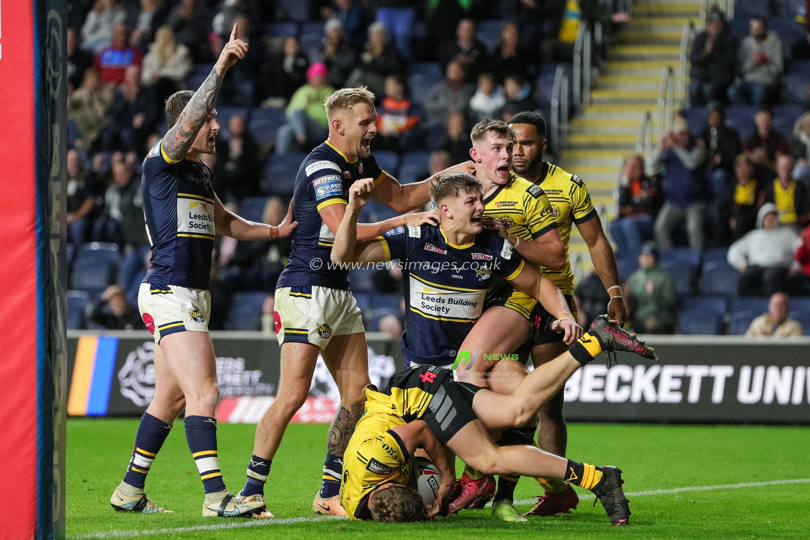 Sam Walters #22 of Leeds Rhinos celebrates his try and makes the score 44-0 in the second half of the Betfred Super League Round 27 match Leeds Rhinos vs Castleford Tigers at Headingley Stadium, Leeds, United Kingdom, 22nd September 2023

(Photo by James Heaton/News Images)