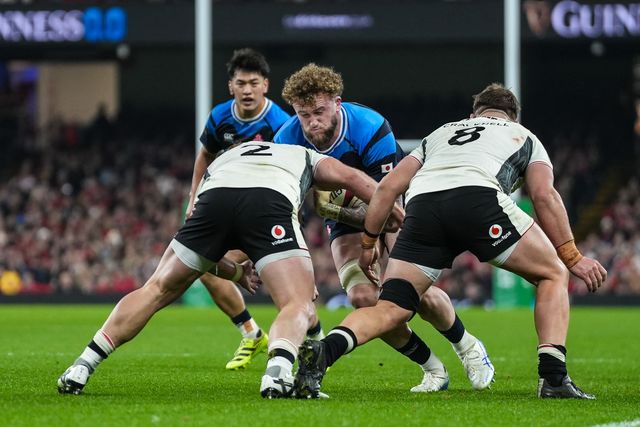 Warner Dearns of Japan is tackled by Dewi Lake of Wales during the Quilter Nations Series 2025 match Wales vs Japan at Principality Stadium, Cardiff, United Kingdom, 15th November 2025

(Photo by Andrew Lewis/News Images)

*** GER AUT SUI OUT ***