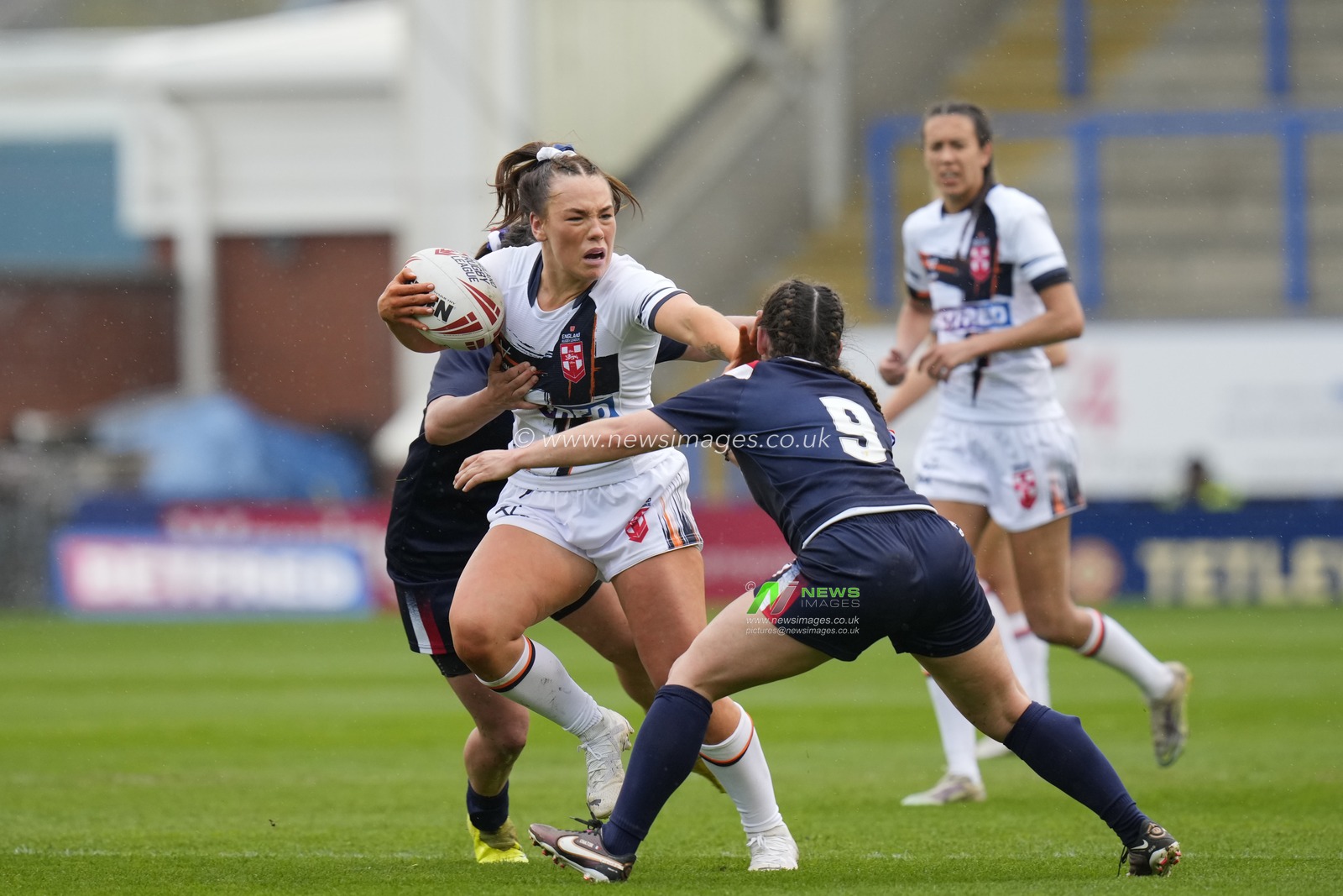 Hollie-Mae Dodd #12 of England hands off Fanny Ramos #9 of France during the Mid Season International match England Women vs France Women at Halliwell Jones Stadium, Warrington, United Kingdom, 29th April 2023

(Photo by Steve Flynn/News Images)