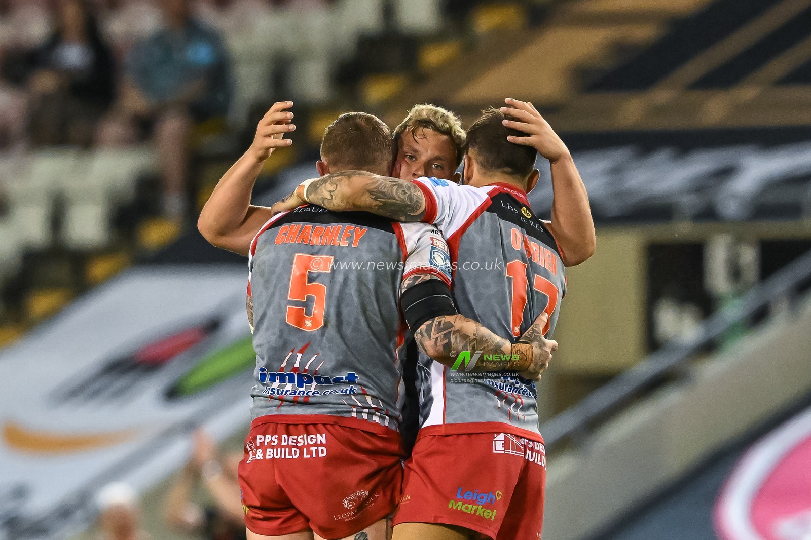 Josh Charnley #5, Gareth Obrein #17 and Lachlan Lam #7 of Leigh Leopards celebrate at the end of the Betfred Super League Round 13 match Leigh Leopards vs Warrington Wolves at Leigh Sports Village, Leigh, United Kingdom, 26th May 2023

(Photo by Craig Thomas/News Images)