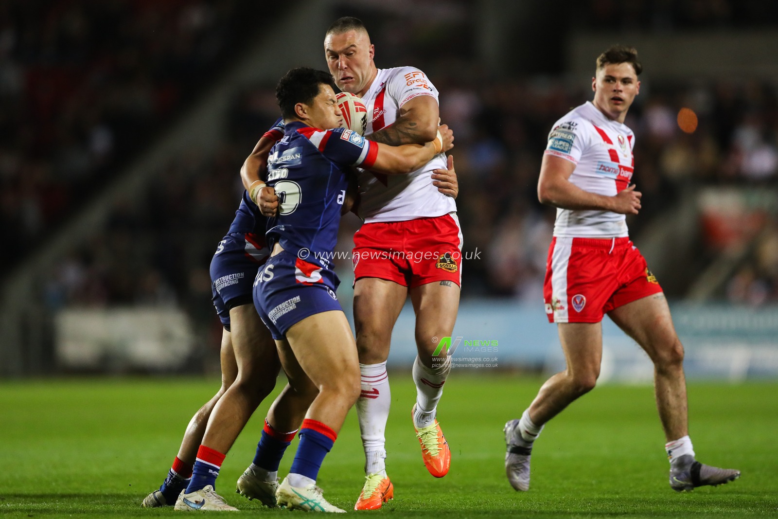 Curtis Sironen of St. Helens is tackled during the Betfred Super League  Round 7 match St Helens vs Wakefield Trinity at Totally Wicked Stadium, St Helens, United Kingdom, 11th April 2025

(Photo by Gareth Evans/News Images)