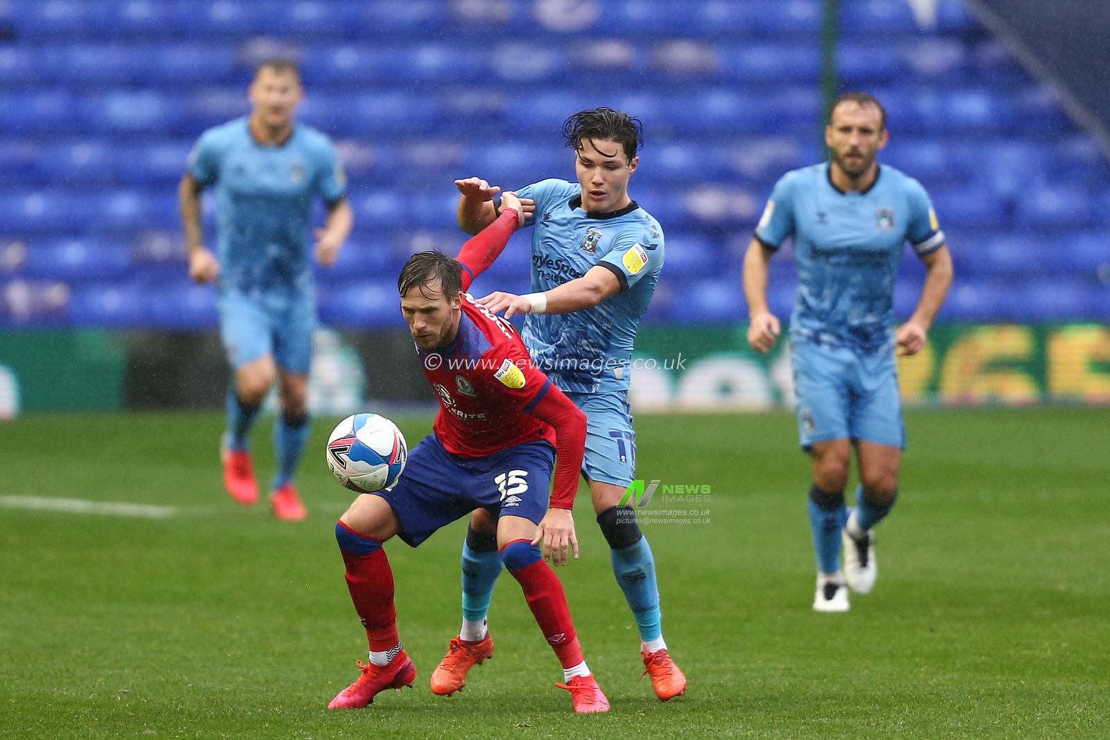 Barry Douglas (15) of Blackburn Rovers holds of Callum OHare (11) of Coventry City
