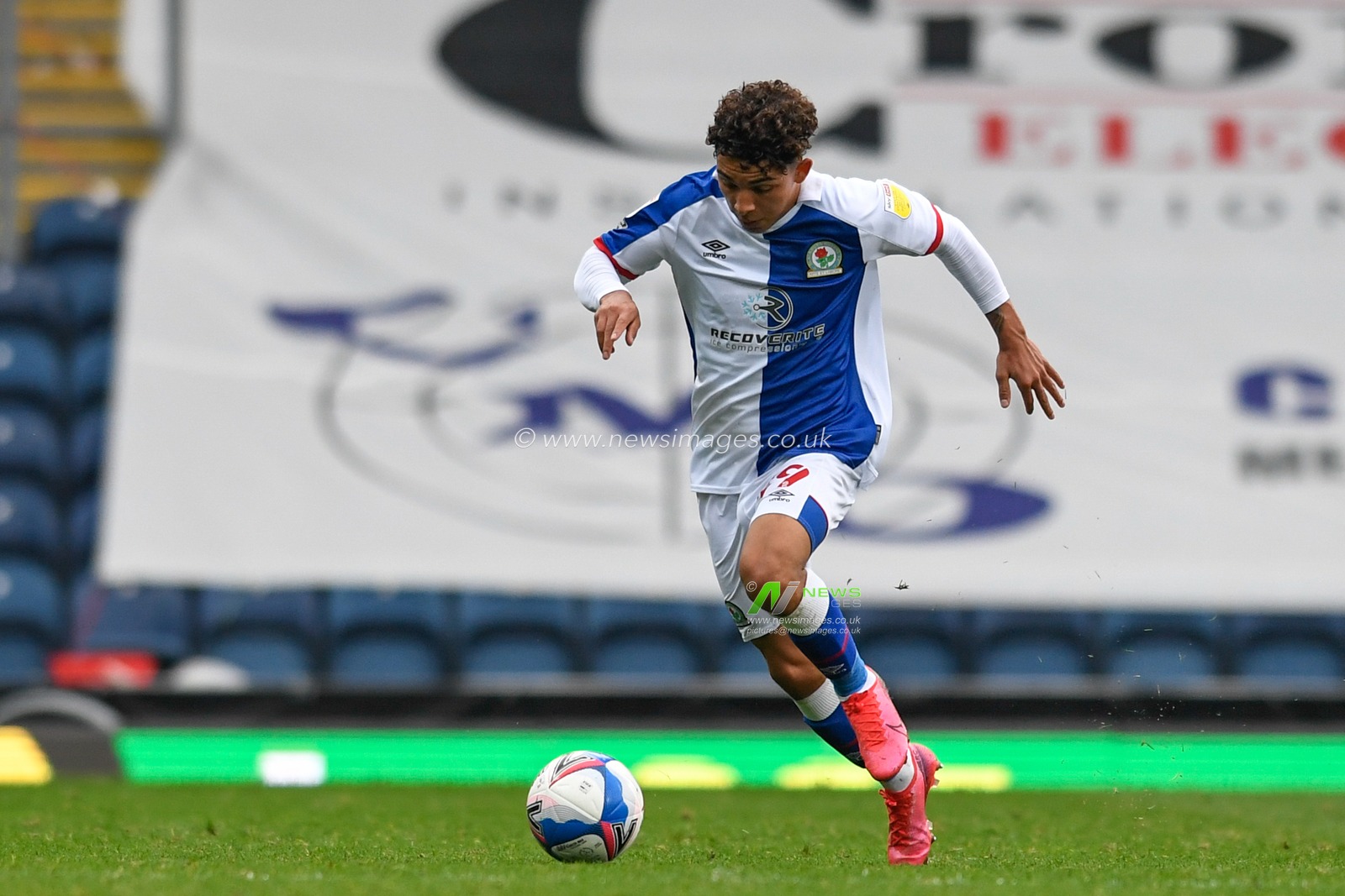 Tyrhys Dolan (39) of Blackburn Rovers runs forward with the ball