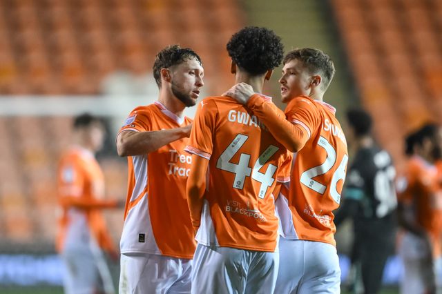 Takudzwa Gwanzura of Blackpool is consoled by Matt Pennington of Blackpool and Zac Ashworth of Blackpool after his missed his penalty during the Bristol Street Motors Trophy match Blackpool vs Liverpool U21 at Bloomfield Road, Blackpool, United Kingdom, 6th November 2024

(Photo by Craig Thomas/News Images)