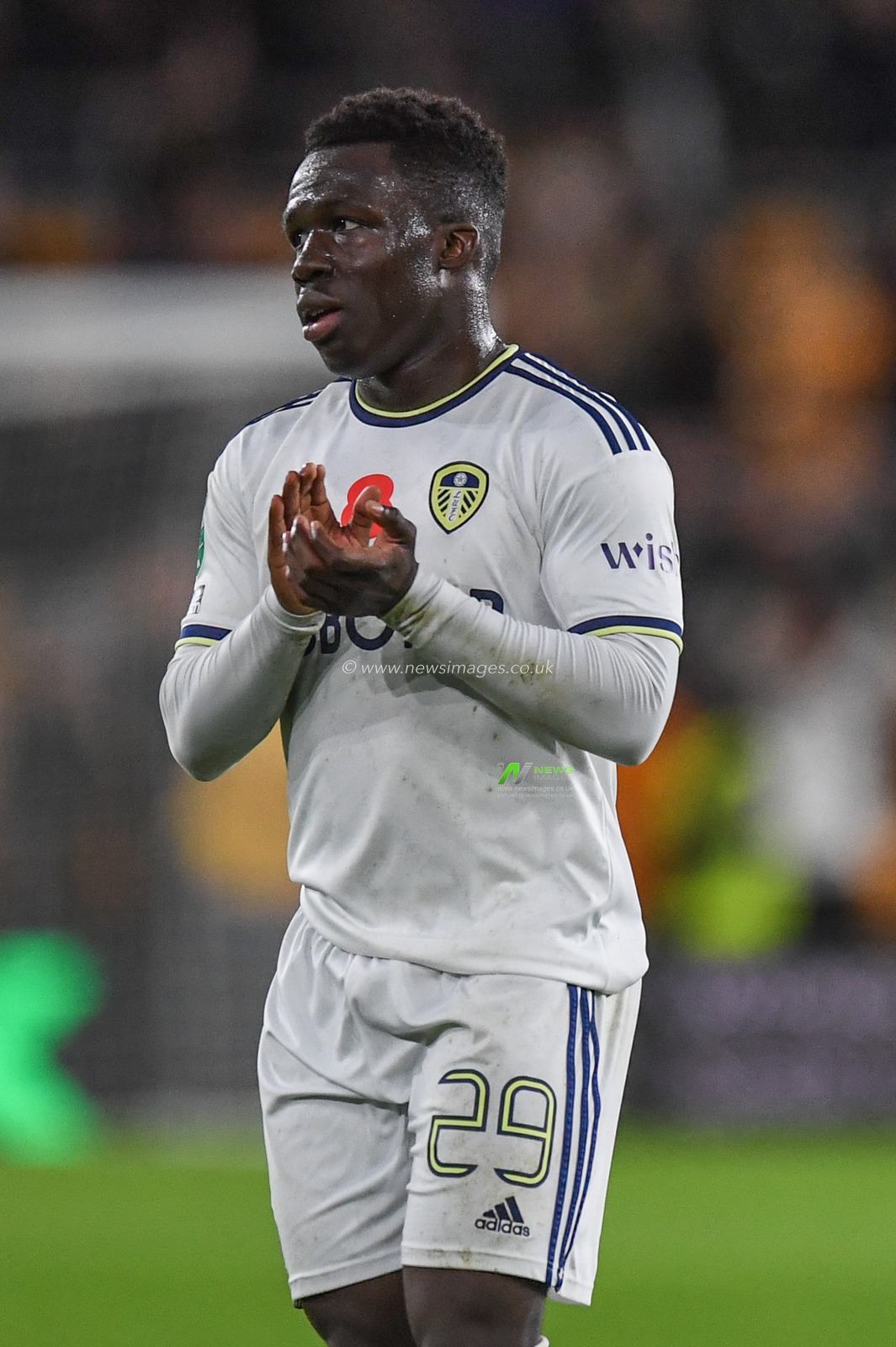 Wilfried Gnonto #29 of Leeds United  Applauds the travelling supporters during the Carabao Cup match Wolverhampton Wanderers vs Leeds United at Molineux, Wolverhampton, United Kingdom, 9th November 2022

(Photo by Mike Jones/News Images)