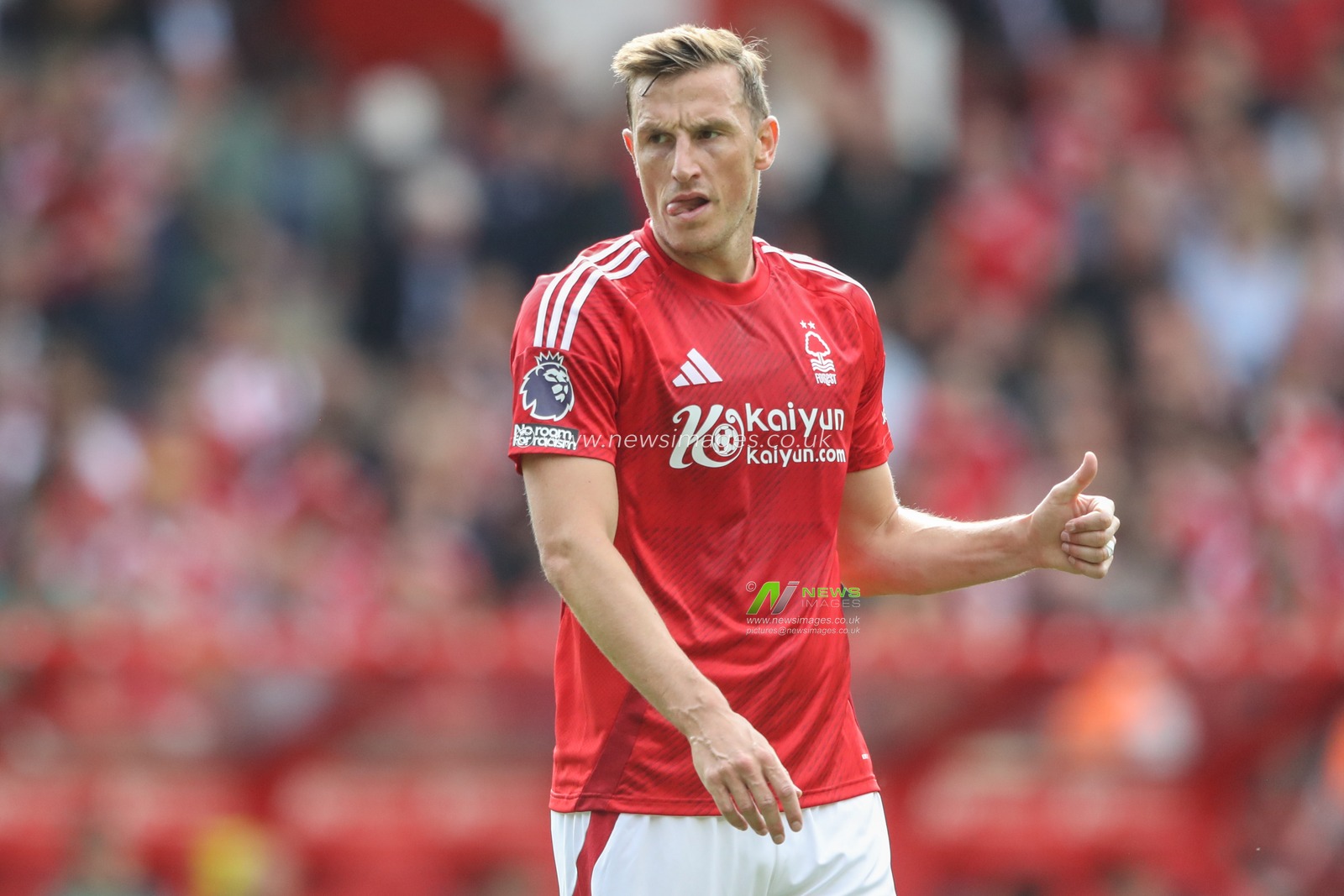 Chris Wood of Nottingham Forest gives his teammate the thumbs up during the Premier League match Nottingham Forest vs Bournemouth at City Ground, Nottingham, United Kingdom, 17th August 2024

(Photo by Alfie Cosgrove/News Images)