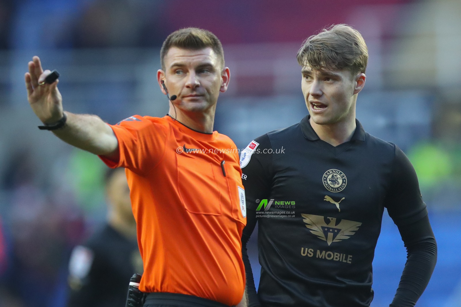 Luca Connell #48 of Barnsley talks to referee Oliver Yates during the Sky Bet League 1 match Reading vs Barnsley at Select Car Leasing Stadium, Reading, United Kingdom, 9th December 2023

(Photo by Gareth Evans/News Images)