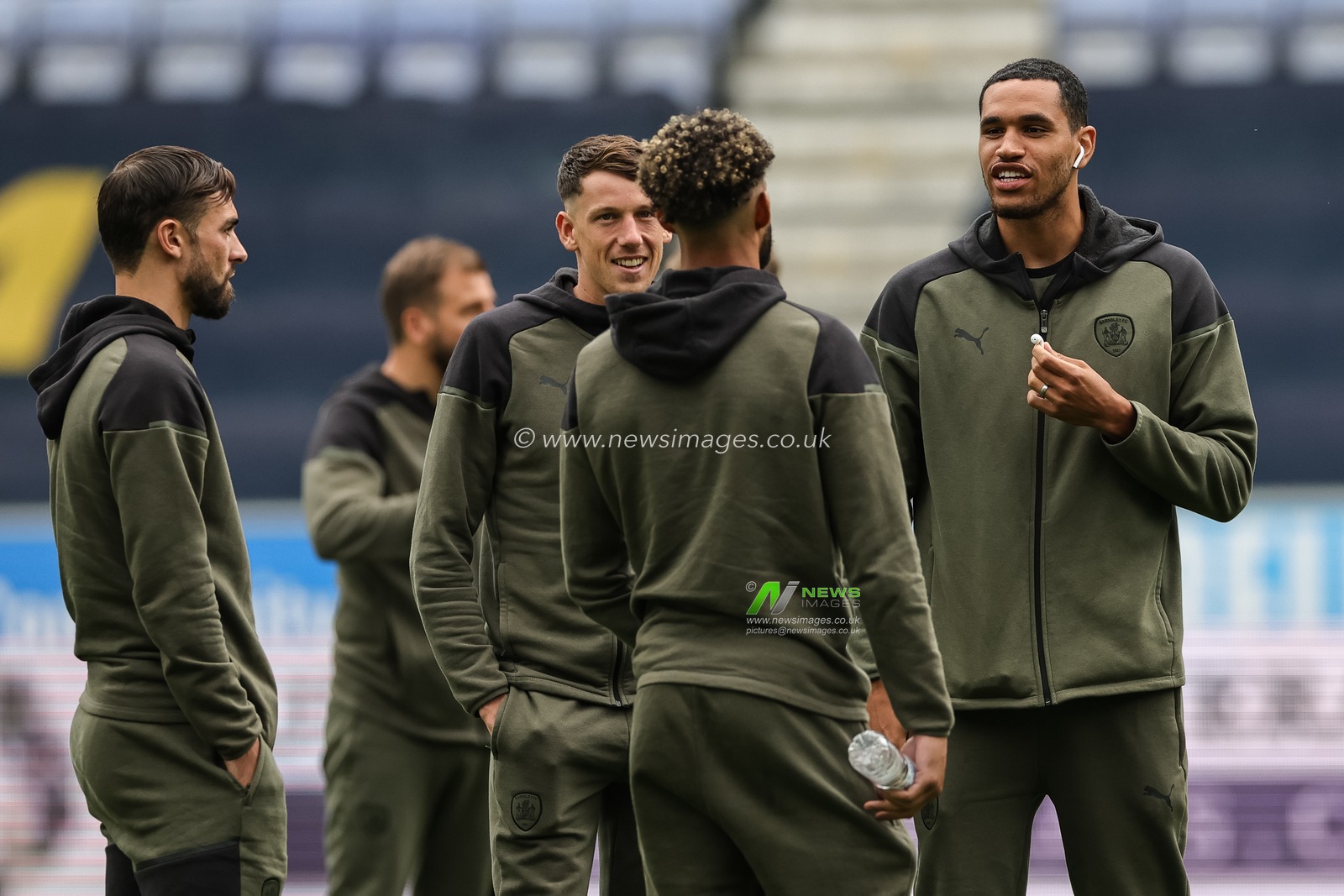 Jon Russell #3 of Barnsley speaks to Barry Cotter #17 of Barnsley during the Sky Bet League 1 match Wigan Athletic vs Barnsley at DW Stadium, Wigan, United Kingdom, 26th August 2023

(Photo by Mark Cosgrove/News Images)