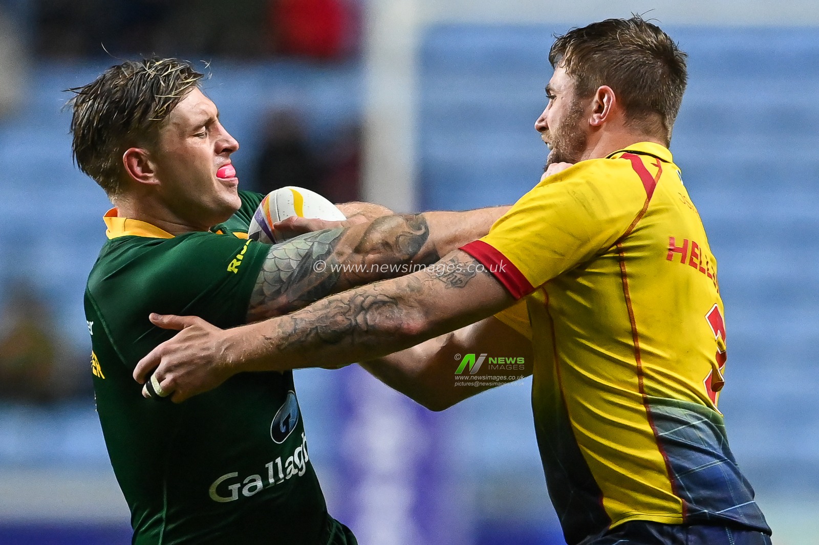 Cameron Munster of Australia is tackled by Ben Hellewell of Scotland during the Rugby League World Cup 2021 match Australia vs Scotland at Coventry Building Society Arena, Coventry, United Kingdom, 21st October 2022

(Photo by Craig Thomas/News Images)