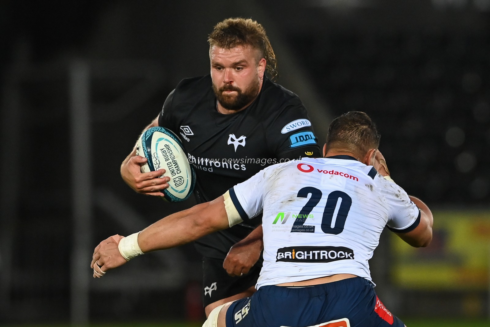 Tomas Francis of Ospreys is tackled by Arno Botha of Vodacom Bulls