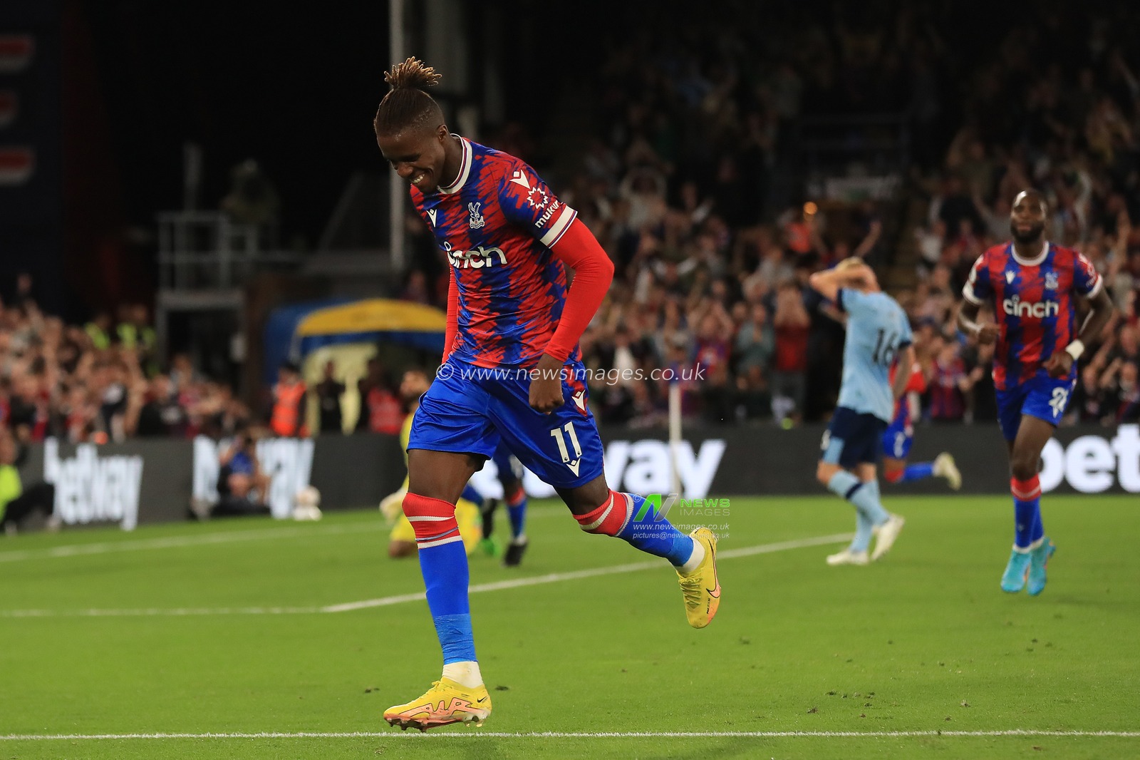 GOAL:  Wilfried Zaha #11 of Crystal Palace celebrates scoring.
