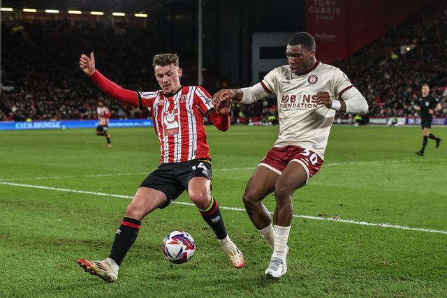 Harrison Burrows of Sheffield United and Sinclair Armstrong of Bristol City battle for the ball during the Sky Bet Championship match Sheffield United vs Bristol City at Bramall Lane, Sheffield, United Kingdom, 11th March 2025

(Photo by Alfie Cosgrove/News Images)