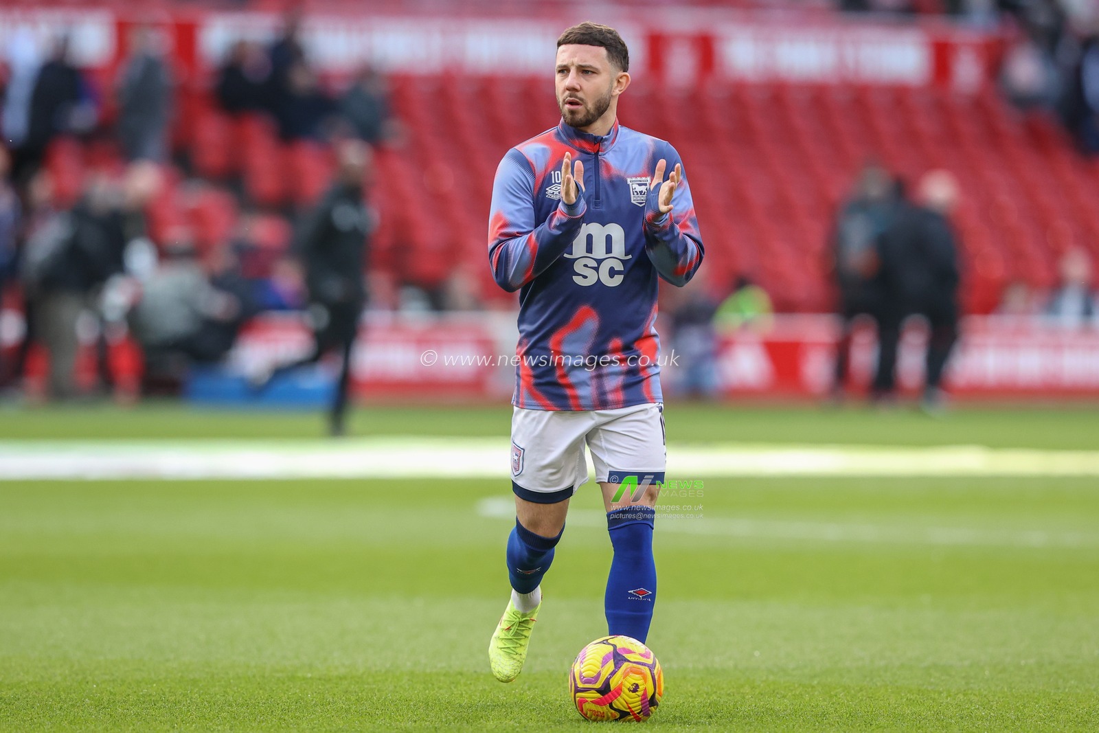 Conor Chaplin of Ipswich Town applauds the fans as he comes out for the warmup during the Premier League match Nottingham Forest vs Ipswich Town at City Ground, Nottingham, United Kingdom, 30th November 2024

(Photo by Alfie Cosgrove/News Images)