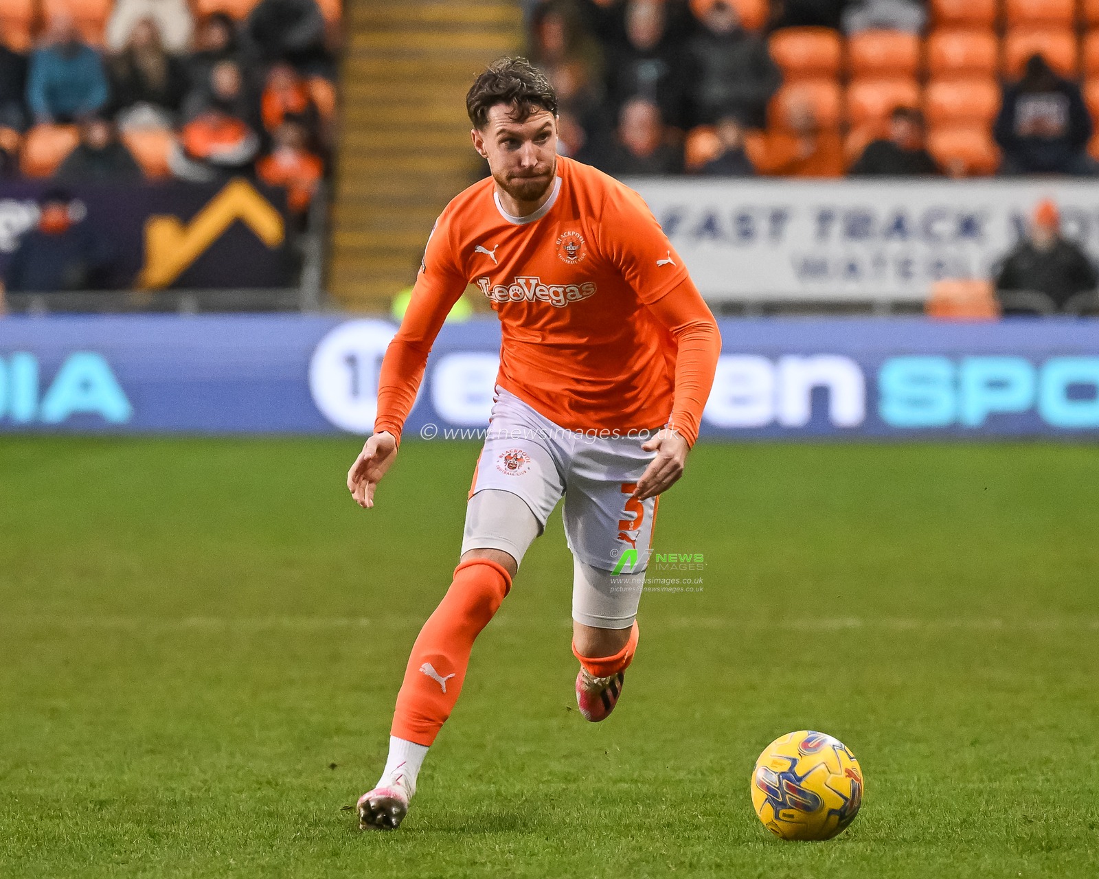 James Husband of Blackpool makes a break with the ball during the Sky Bet League 1 match Blackpool vs Exeter City at Bloomfield Road, Blackpool, United Kingdom, 13th January 2024

(Photo by Craig Thomas/News Images)