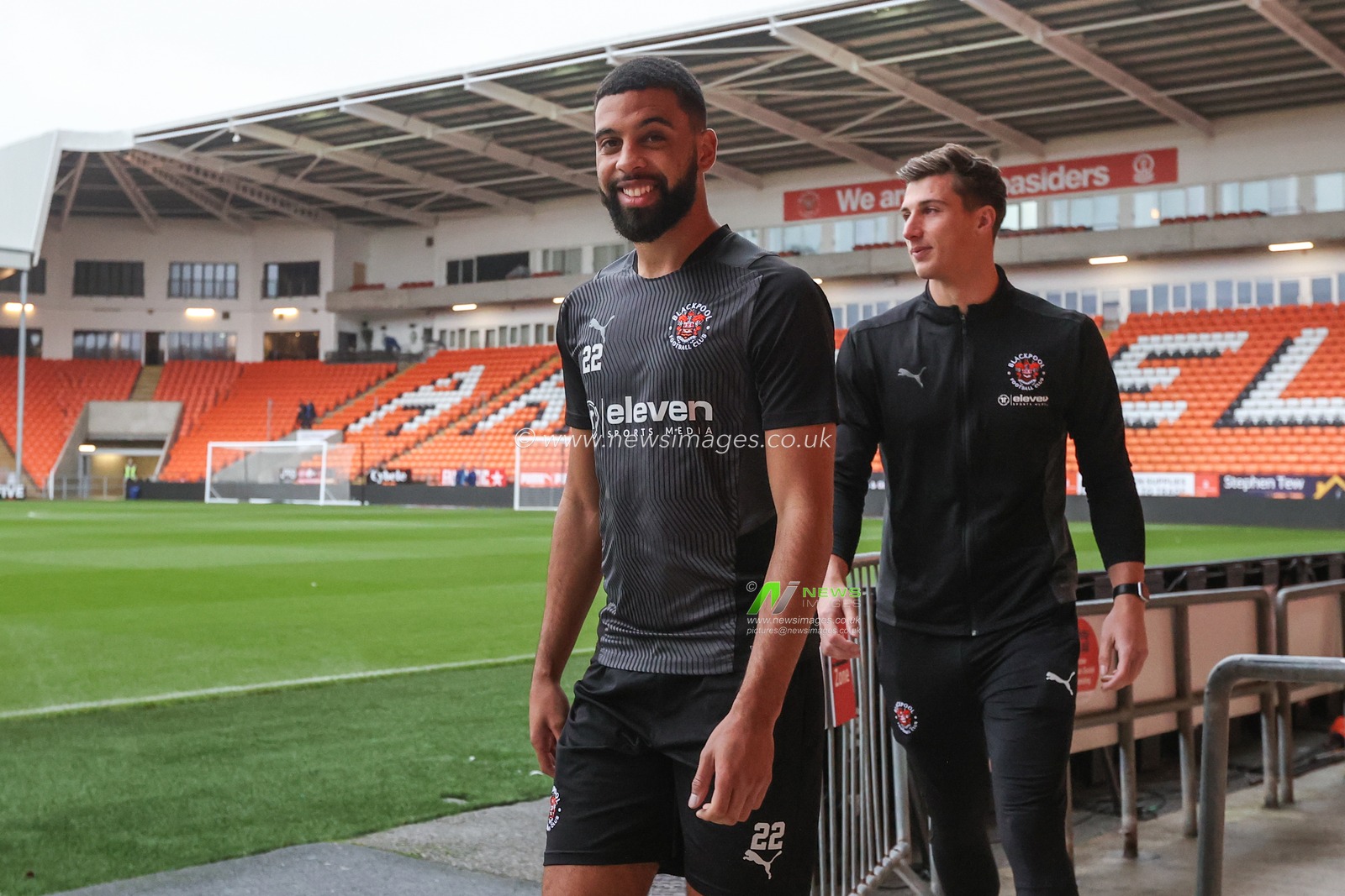 Cj Hamilton #22 of Blackpool arrives at Bloomfield Road