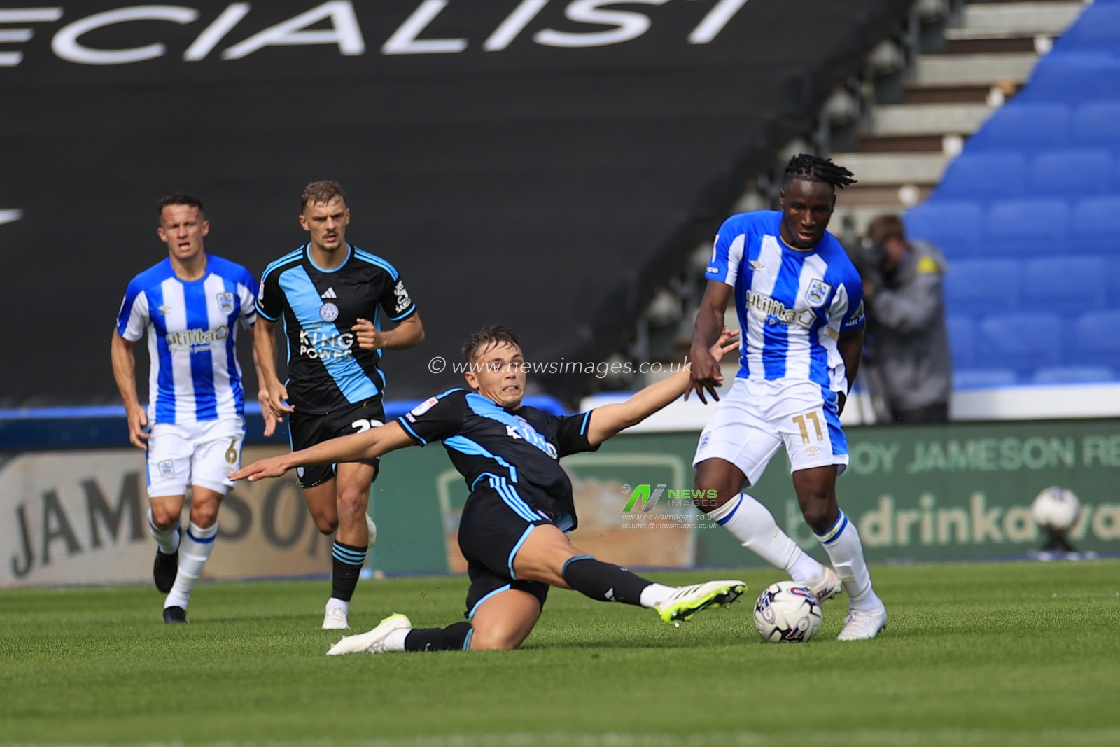 Brahima Diarra #11 of Huddersfield Town is challenged by Callum Doyle #5 of Leicester City during the Sky Bet Championship match Huddersfield Town vs Leicester City at John Smith's Stadium, Huddersfield, United Kingdom, 12th August 2023

(Photo by Conor Molloy/News Images)