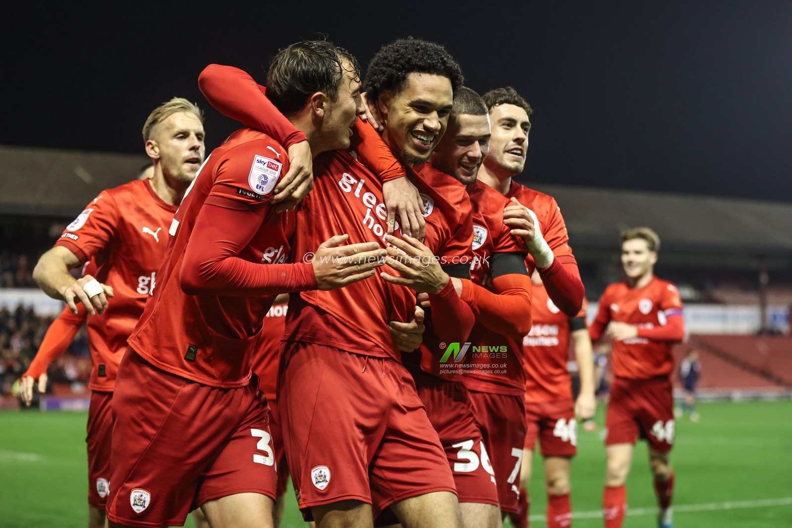 Jon Russell of Barnsley celebrates his goal to make it 1-0 during the Sky Bet League 1 match Barnsley vs Rotherham United at Oakwell, Barnsley, United Kingdom, 8th November 2024

(Photo by Alfie Cosgrove/News Images)