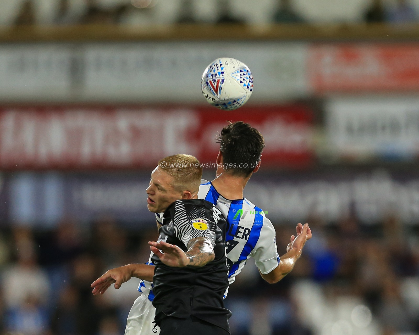 5th August 2019, John Smiths Stadium, Huddersfield England; Sky Bet Championship, Huddersfield Town vs Derby County ; Martyn Waghorn (9) of Derby County and Christopher Schindler (26) of Huddersfield Town dual for the ball


Credit: Mark Cosgrove/News Images

English Football League images are subject to DataCo Licence