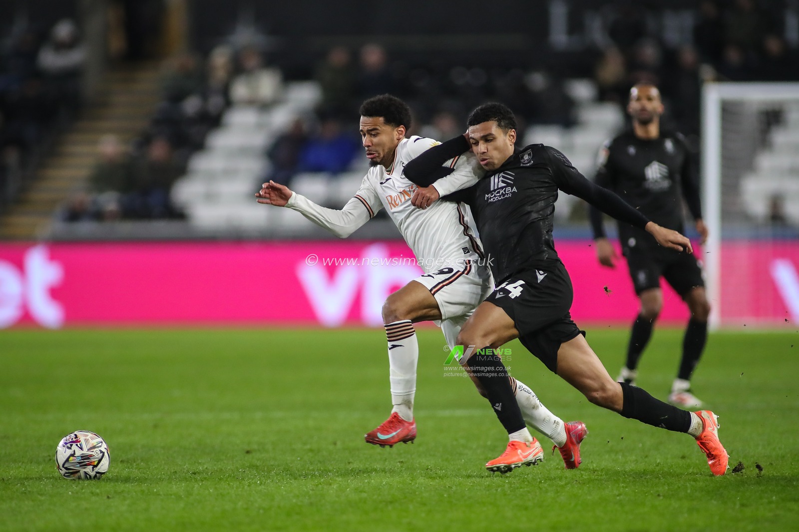 Shea Charles of Sheffield Wednesday and Florian Bianchini of Swansea City compete for the ball during the Sky Bet Championship match Swansea City vs Sheffield Wednesday at Swansea.com Stadium, Swansea, United Kingdom, 12th February 2025

(Photo by Andrew Lewis/News Images)
