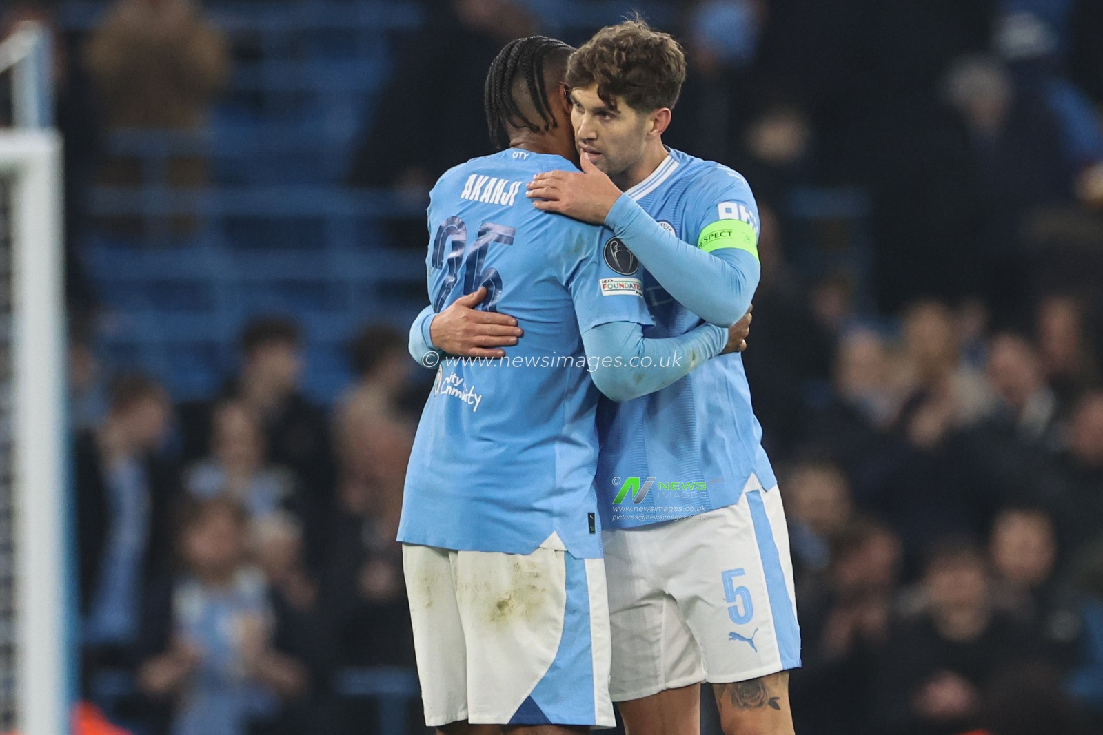 John Stones of Manchester City embraces Manuel Akanji of Manchester City during the UEFA Champions League match Manchester City vs F.C. Copenhagen at Etihad Stadium, Manchester, United Kingdom, 6th March 2024

(Photo by Mark Cosgrove/News Images)