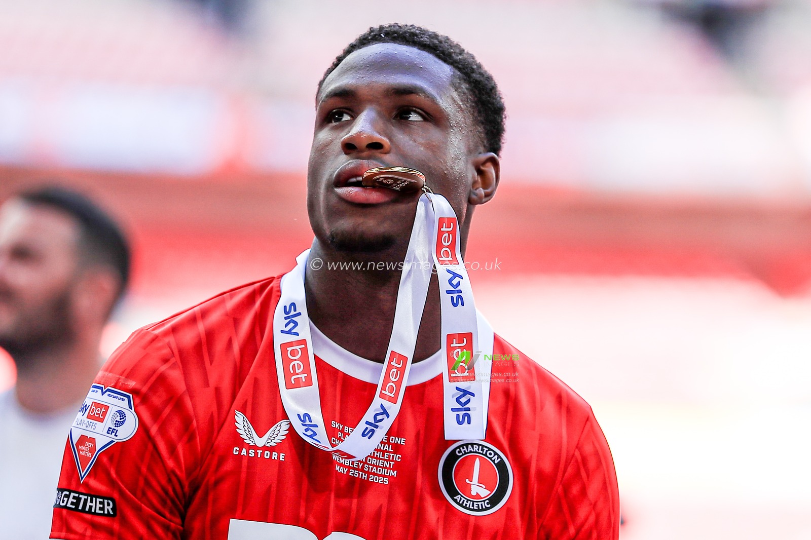 Thierry Small of Charlton Athletic celebrate getting promotion back to the Sky Bet Championship after the Sky Bet League 1 Playoff Final match Charlton Athletic vs Leyton Orient at Wembley Stadium, London, United Kingdom, 25th May 2025

(Photo by Jorge Horsted/News Images)
