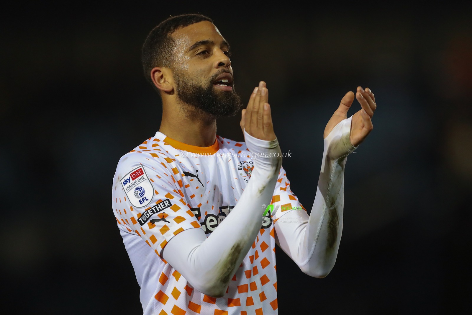 CJ Hamilton #22 of Blackpool celebrates his teams win after the Sky Bet League 1 match Portsmouth vs Blackpool at Fratton Park, Portsmouth, United Kingdom, 25th November 2023

(Photo by Gareth Evans/News Images)