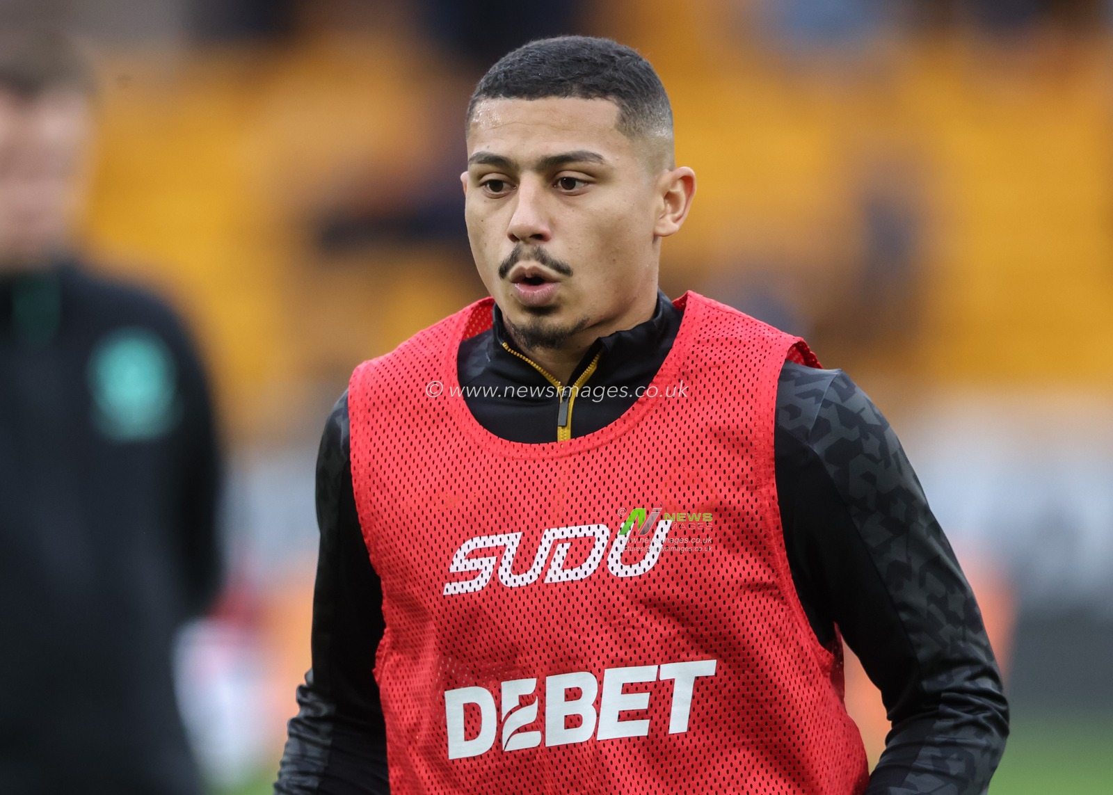 AndrÃ© of Wolverhampton Wanderers warms up ahead of the Premier League match Wolverhampton Wanderers vs Newcastle United at Molineux, Wolverhampton, United Kingdom, 15th September 2024

(Photo by Alfie Cosgrove/News Images)