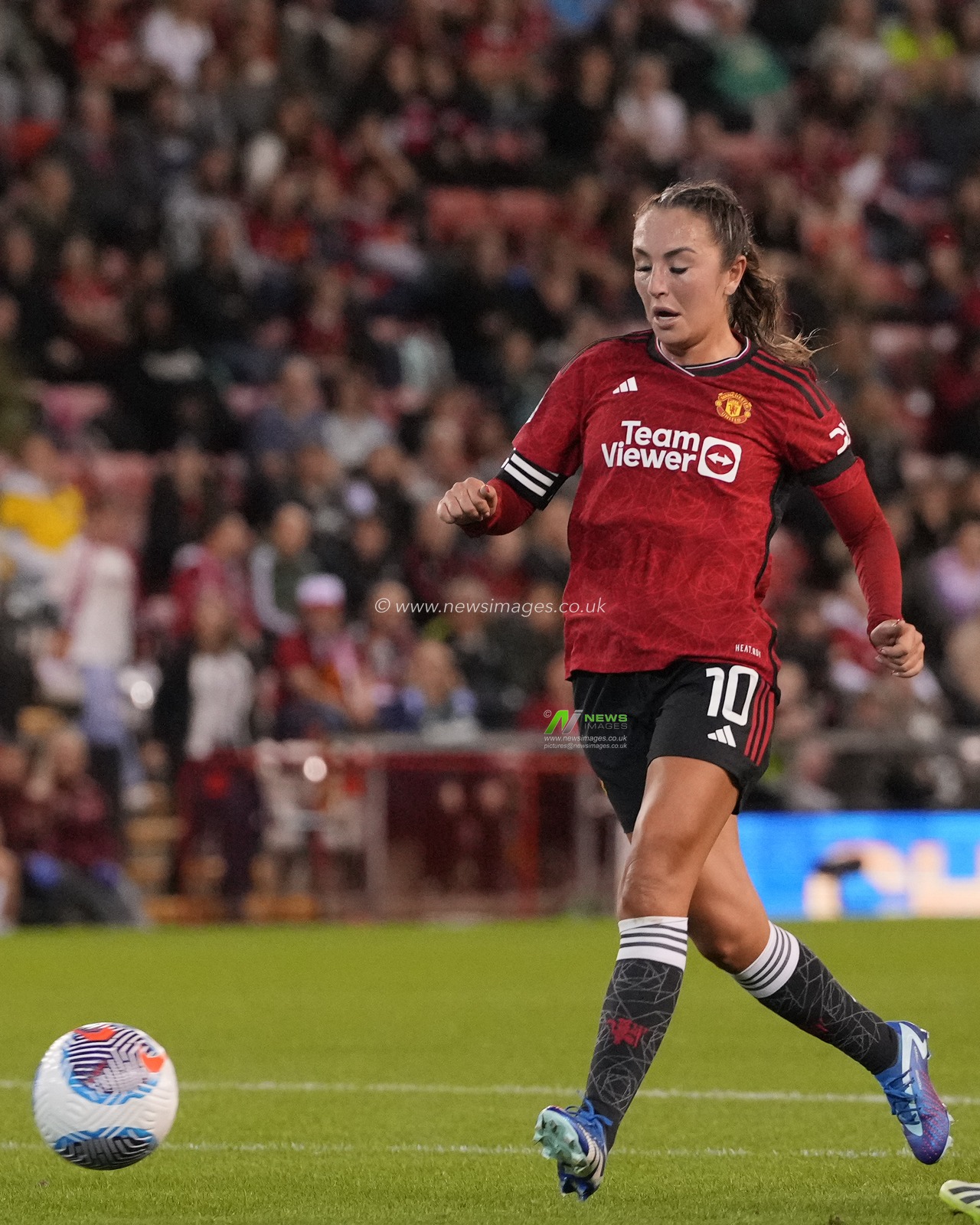 Katie Zelem #10 of Manchester United passes the ball during the The FA Women's Super League match Manchester United Women vs Arsenal Women at Leigh Sports Village, Leigh, United Kingdom, 6th October 2023

(Photo by Steve Flynn/News Images)