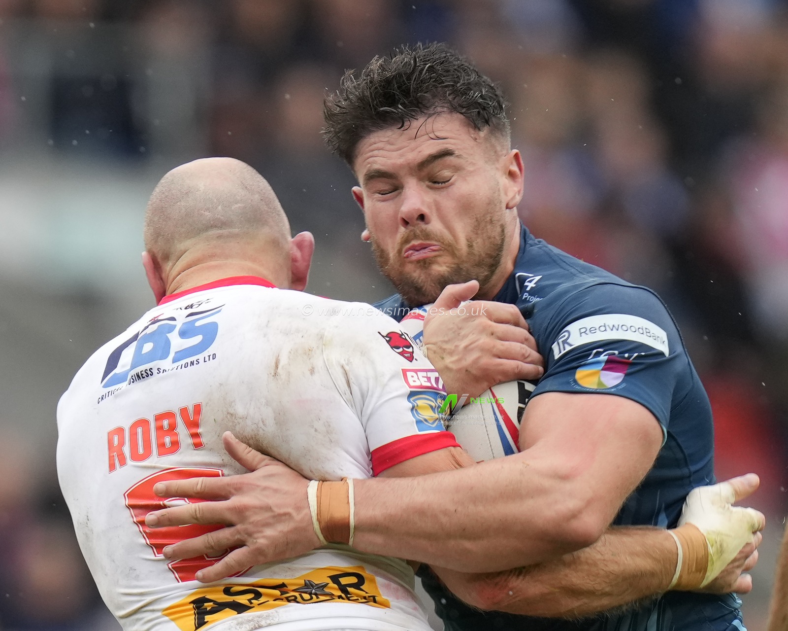 Joe Philbin #15 of Warrington Wolves runs into James Roby #9 of St. Helens during the Betfred Super League Eliminator match St Helens vs Warrington Wolves at Totally Wicked Stadium, St Helens, United Kingdom, 30th September 2023

(Photo by Steve Flynn/News Images)