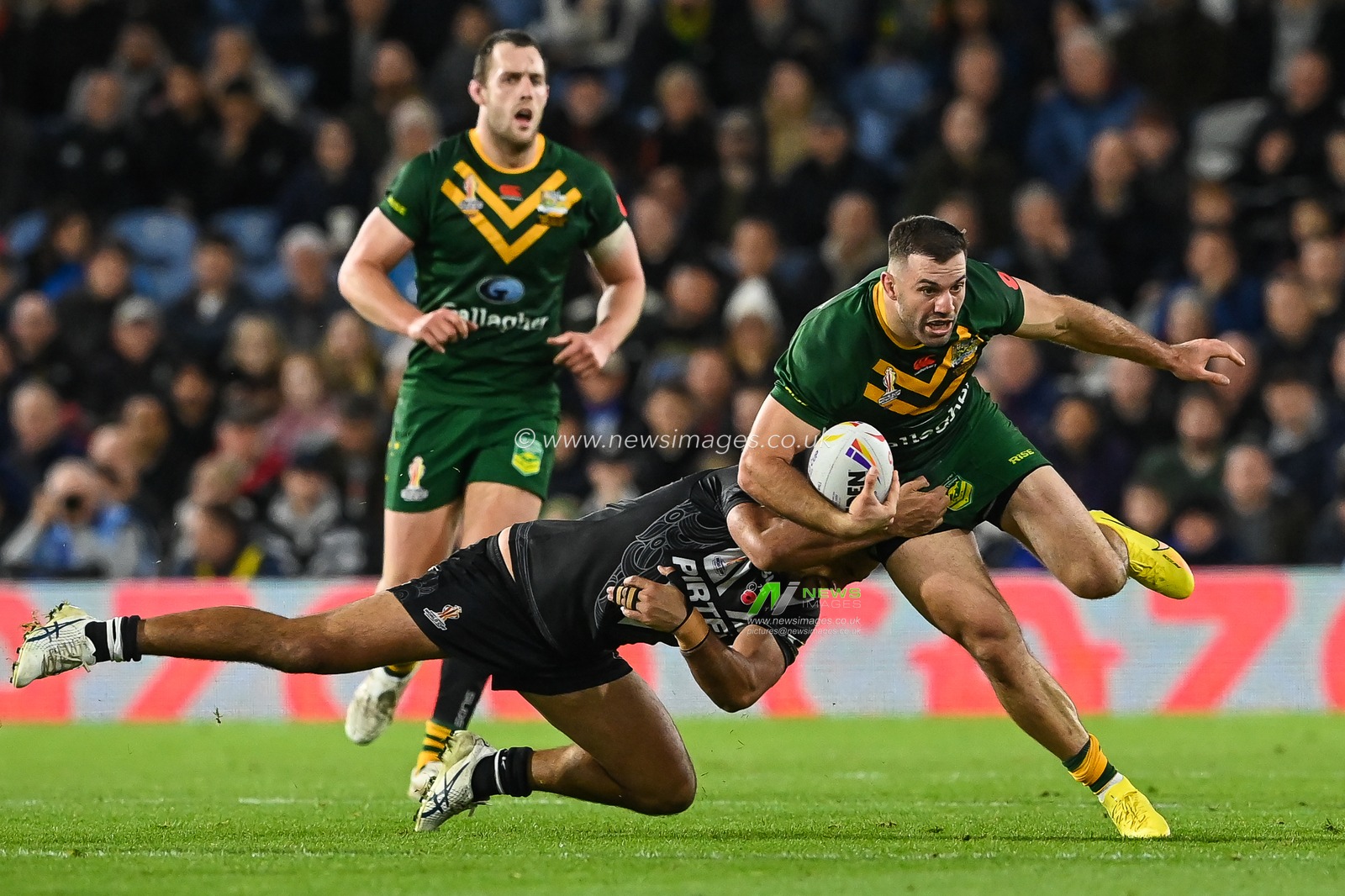 James Tedesco of Australia is tackled by Peta Hiku of New Zealand during the Rugby League World Cup 2021 Semi Final match Australia vs New Zealand at Elland Road, Leeds, United Kingdom, 11th November 2022

(Photo by Craig Thomas/News Images)