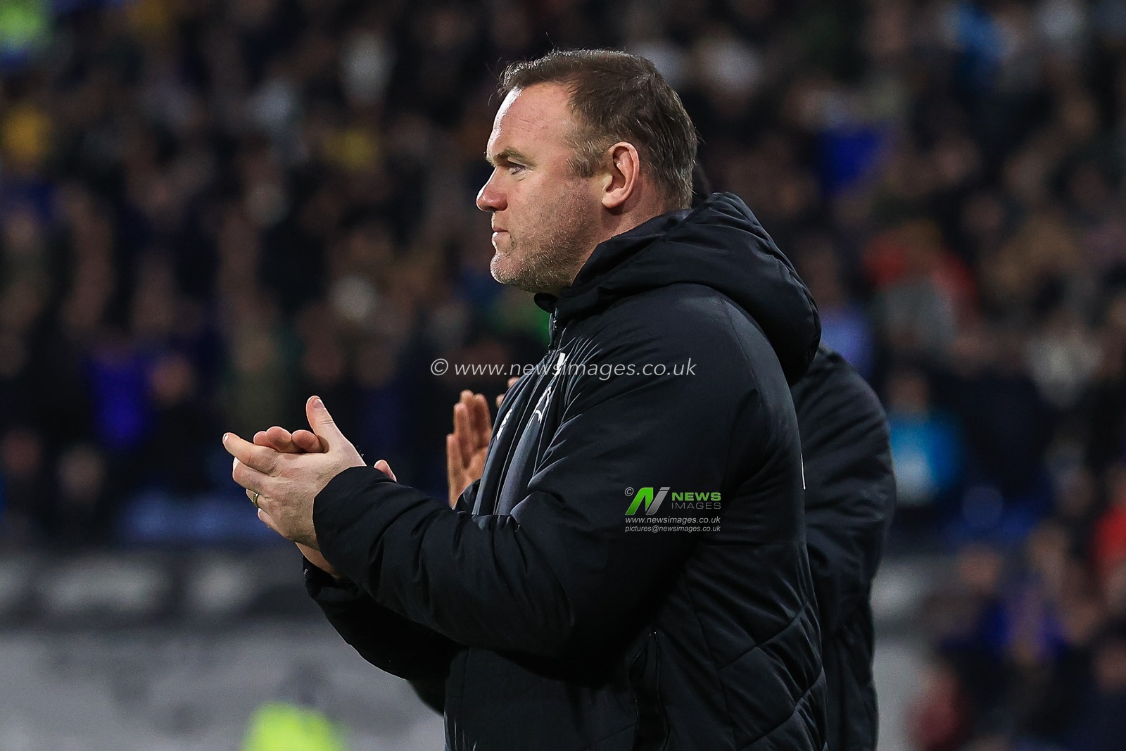 Wayne Rooney manager of Derby County applauds this side during the game